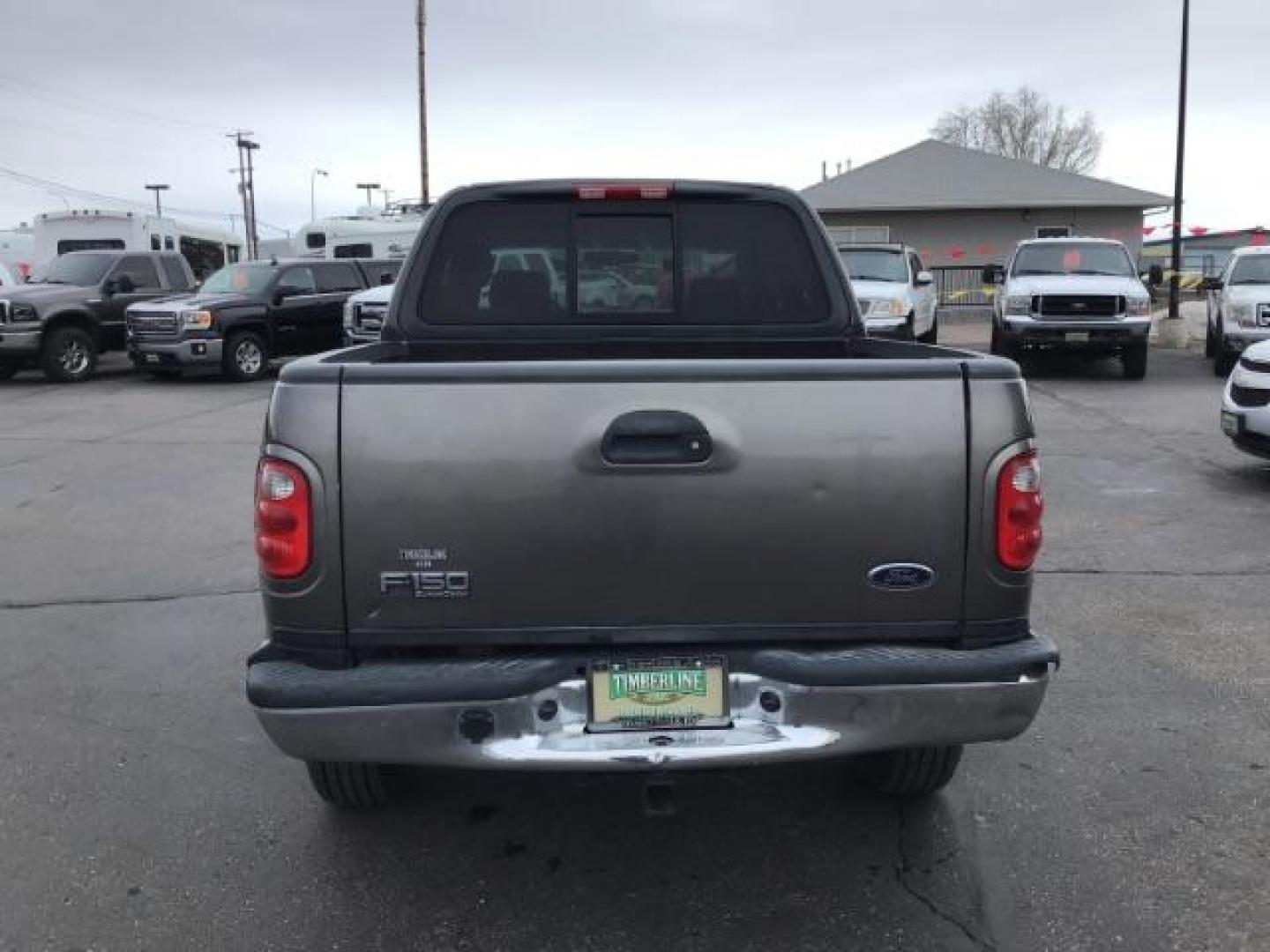 2002 Oxford White /Medium Graphite Cloth Interior Ford F-150 XLT SuperCrew Short Bed 4WD (1FTRW08L02K) with an 5.4L V8 SOHC 16V engine, 4-Speed Automatic transmission, located at 1235 N Woodruff Ave., Idaho Falls, 83401, (208) 523-1053, 43.507172, -112.000488 - This 2002 Ford F150 4x4 XLT, has 151,000 miles. Comes with cloth interior, cruise control, power drivers seat, AM/FM CD stereo, and power windows. At Timberline Auto it is always easy to find a great deal on your next vehicle! Our experienced sales staff can help find the right vehicle will fit your - Photo#3