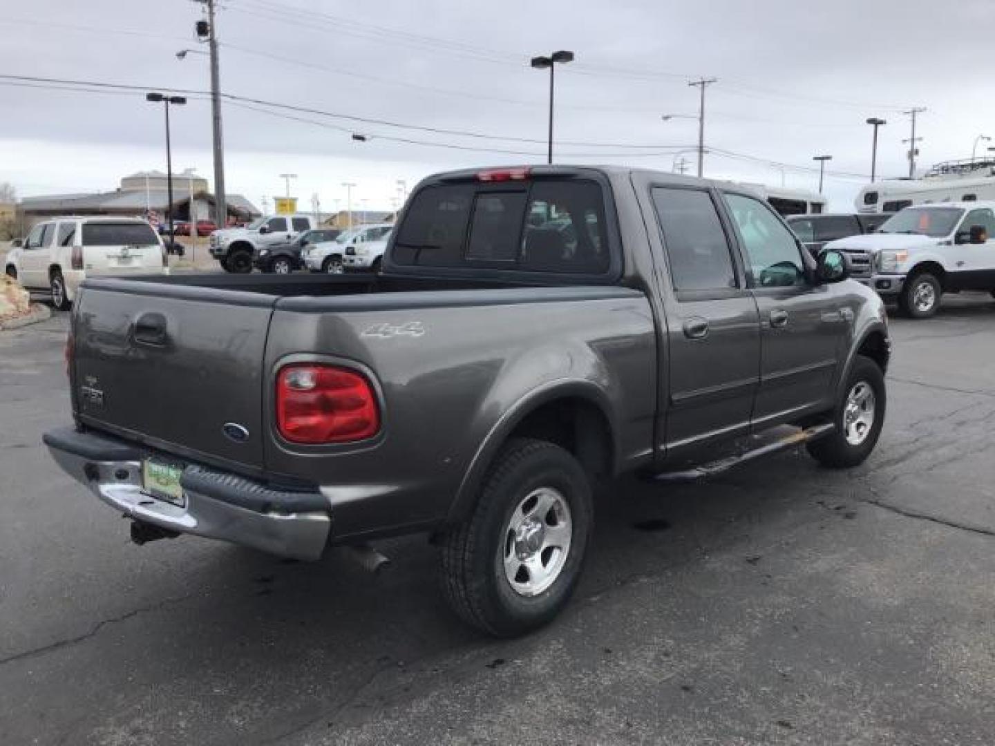 2002 Oxford White /Medium Graphite Cloth Interior Ford F-150 XLT SuperCrew Short Bed 4WD (1FTRW08L02K) with an 5.4L V8 SOHC 16V engine, 4-Speed Automatic transmission, located at 1235 N Woodruff Ave., Idaho Falls, 83401, (208) 523-1053, 43.507172, -112.000488 - This 2002 Ford F150 4x4 XLT, has 151,000 miles. Comes with cloth interior, cruise control, power drivers seat, AM/FM CD stereo, and power windows. At Timberline Auto it is always easy to find a great deal on your next vehicle! Our experienced sales staff can help find the right vehicle will fit your - Photo#4