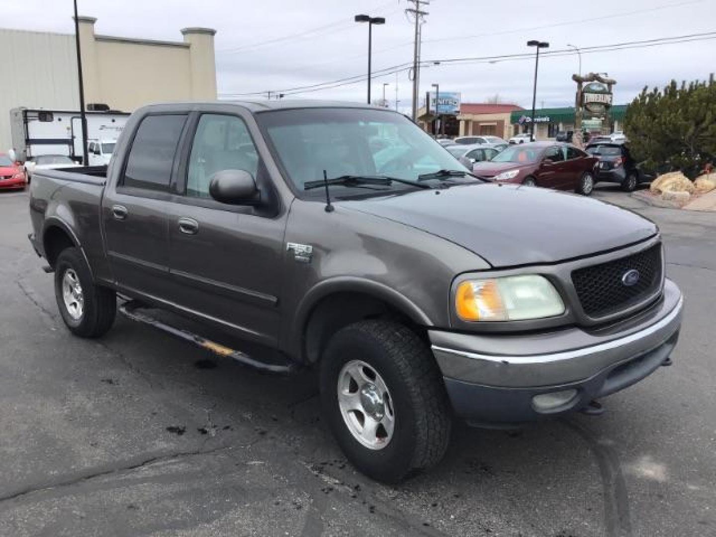 2002 Oxford White /Medium Graphite Cloth Interior Ford F-150 XLT SuperCrew Short Bed 4WD (1FTRW08L02K) with an 5.4L V8 SOHC 16V engine, 4-Speed Automatic transmission, located at 1235 N Woodruff Ave., Idaho Falls, 83401, (208) 523-1053, 43.507172, -112.000488 - This 2002 Ford F150 4x4 XLT, has 151,000 miles. Comes with cloth interior, cruise control, power drivers seat, AM/FM CD stereo, and power windows. At Timberline Auto it is always easy to find a great deal on your next vehicle! Our experienced sales staff can help find the right vehicle will fit your - Photo#6