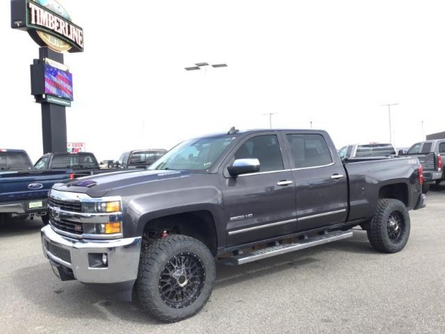 2015 GRAY /Jet Black Chevrolet Silverado 2500HD LTZ Crew Cab 4WD (1GC1KWE80FF) with an 6.6L V8 OHV 32V TURBO DIESEL engine, 6-Speed Automatic transmission, located at 1235 N Woodruff Ave., Idaho Falls, 83401, (208) 523-1053, 43.507172, -112.000488 - This 2015 Chevrolet 2500 LTZ 4x4, has the 6.6L duramax motor. It comes with leather interior, heated and cooled seats, remote start, back up camera, blue tooth audio, Bose speakers, and sunroof. At Timberline Auto it is always easy to find a great deal on your next vehicle! Our experienced sales sta - Photo#0