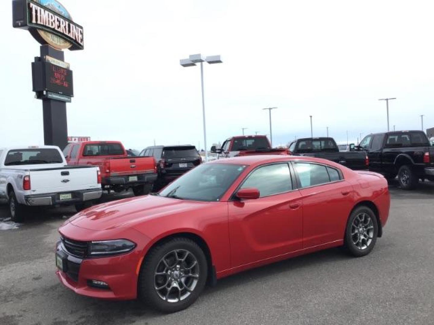 2017 Redline Red Tri-Coat Pearl /Black, cloth Dodge Charger SXT AWD (2C3CDXJG8HH) with an 3.6L V6 DOHC 24V engine, 8-Speed Automatic transmission, located at 1235 N Woodruff Ave., Idaho Falls, 83401, (208) 523-1053, 43.507172, -112.000488 - This 2017 Dodge Charger SXT Rallye, has the V6 motor. It has 74,000 miles. Comes with leather interior, heated and cooled seats, dual power seats, keyless remote, back up camera, and blue tooth audio. At Timberline Auto it is always easy to find a great deal on your next vehicle! Our experienced sal - Photo#0