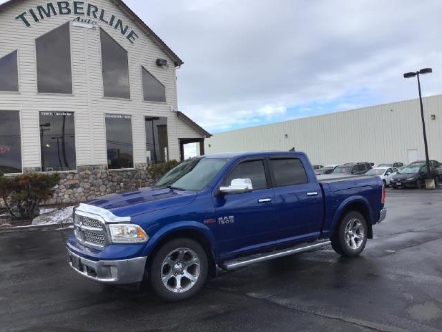 2014 RAM 1500 Laramie Crew Cab SWB 4WD (1C6RR7NM3ES) with an 3.0L V6 DIESEL engine, 8-Speed Automatic transmission, located at 1235 N Woodruff Ave., Idaho Falls, 83401, (208) 523-1053, 43.507172, -112.000488 - Photo#0