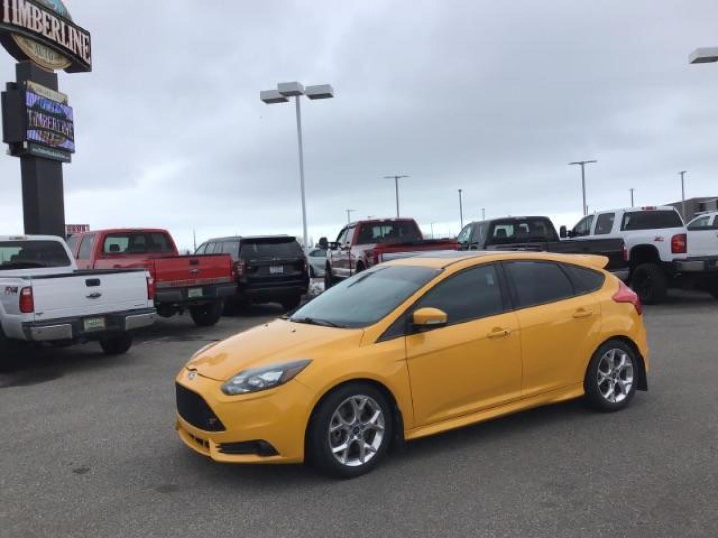 2014 YELLOW /Charcoal Black Ford Focus ST Hatch (1FADP3L96EL) with an 2.0L L4 DOHC 16V engine, 5-Speed Manual transmission, located at 1235 N Woodruff Ave., Idaho Falls, 83401, (208) 523-1053, 43.507172, -112.000488 - This 2014 Ford Focus ST, has 82,000 miles. It has a manual transmission. Comes with Leather interior, heated seats, sunroof, blue tooth audio, touch screen stereo, cruise control, power windows and locks. At Timberline Auto it is always easy to find a great deal on your next vehicle! Our experience - Photo#0