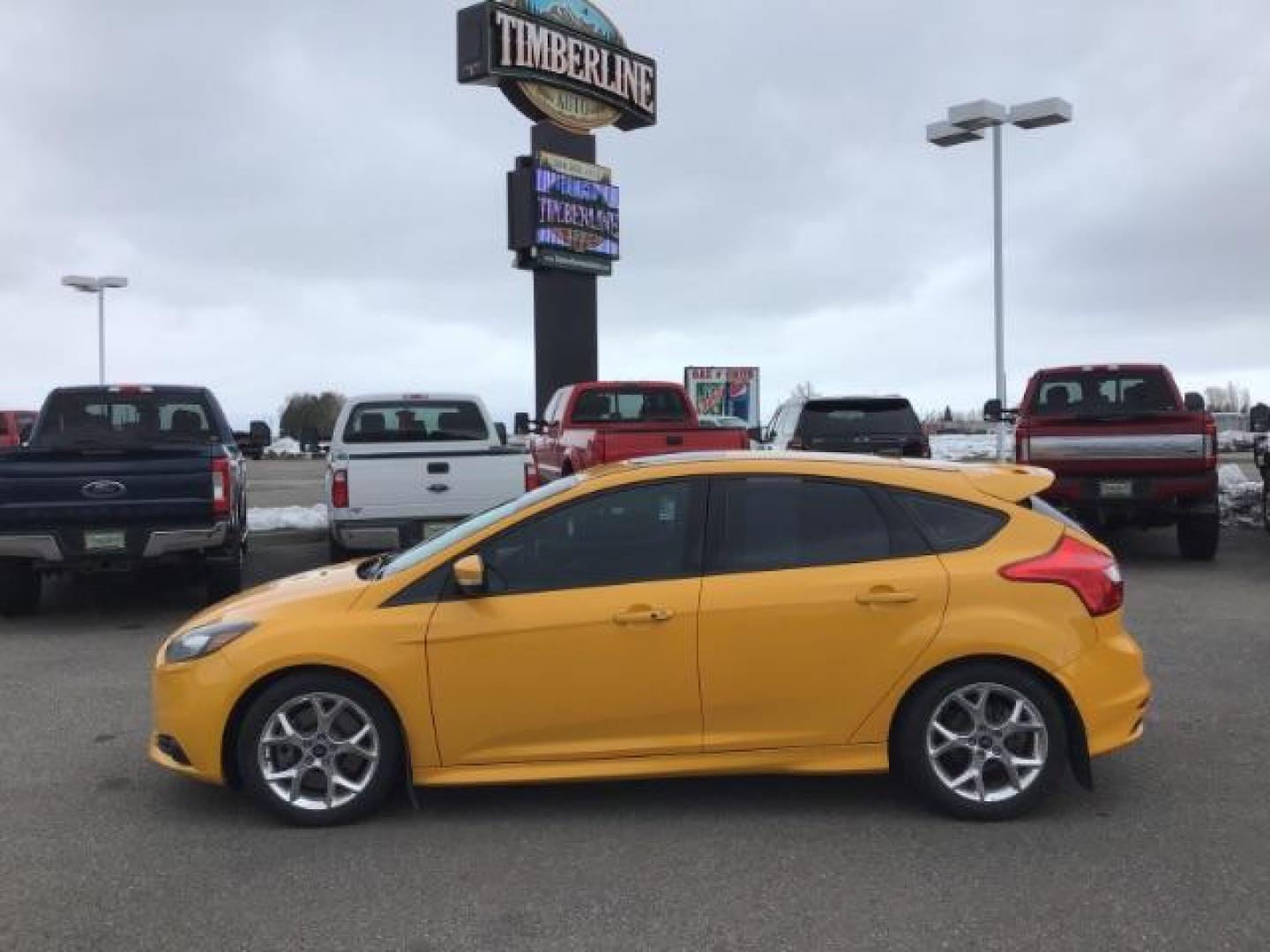 2014 YELLOW /Charcoal Black Ford Focus ST Hatch (1FADP3L96EL) with an 2.0L L4 DOHC 16V engine, 5-Speed Manual transmission, located at 1235 N Woodruff Ave., Idaho Falls, 83401, (208) 523-1053, 43.507172, -112.000488 - This 2014 Ford Focus ST, has 82,000 miles. It has a manual transmission. Comes with Leather interior, heated seats, sunroof, blue tooth audio, touch screen stereo, cruise control, power windows and locks. At Timberline Auto it is always easy to find a great deal on your next vehicle! Our experience - Photo#1