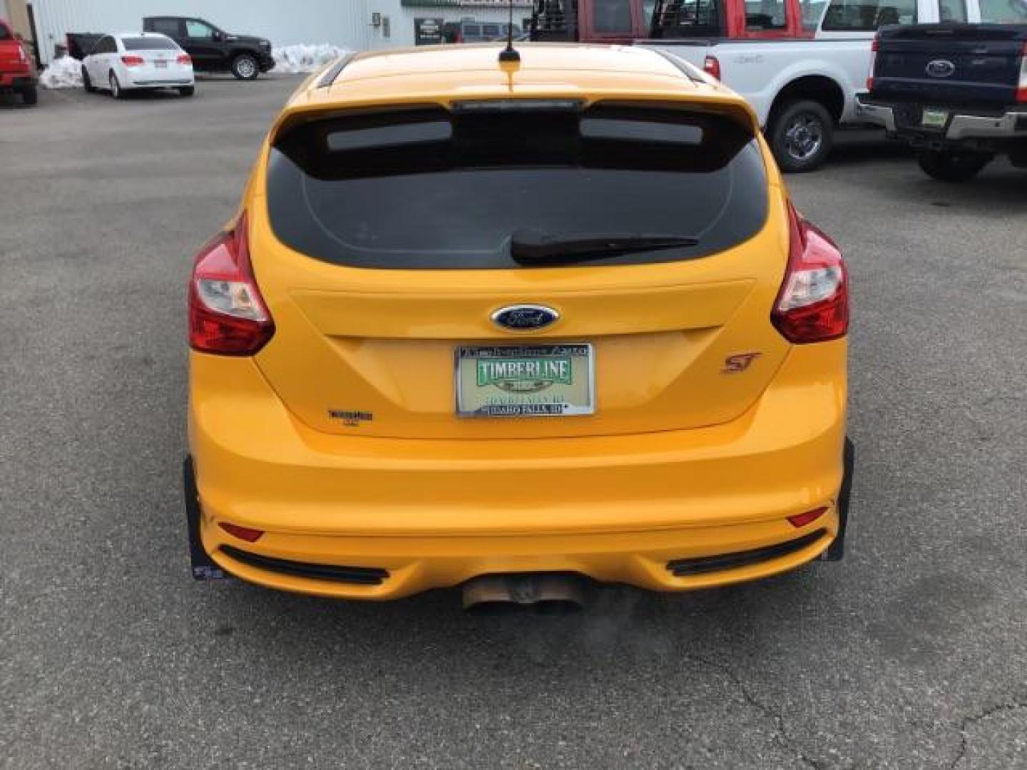 2014 YELLOW /Charcoal Black Ford Focus ST Hatch (1FADP3L96EL) with an 2.0L L4 DOHC 16V engine, 5-Speed Manual transmission, located at 1235 N Woodruff Ave., Idaho Falls, 83401, (208) 523-1053, 43.507172, -112.000488 - This 2014 Ford Focus ST, has 82,000 miles. It has a manual transmission. Comes with Leather interior, heated seats, sunroof, blue tooth audio, touch screen stereo, cruise control, power windows and locks. At Timberline Auto it is always easy to find a great deal on your next vehicle! Our experience - Photo#3