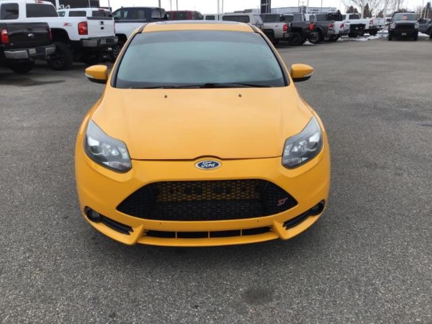 2014 YELLOW /Charcoal Black Ford Focus ST Hatch (1FADP3L96EL) with an 2.0L L4 DOHC 16V engine, 5-Speed Manual transmission, located at 1235 N Woodruff Ave., Idaho Falls, 83401, (208) 523-1053, 43.507172, -112.000488 - This 2014 Ford Focus ST, has 82,000 miles. It has a manual transmission. Comes with Leather interior, heated seats, sunroof, blue tooth audio, touch screen stereo, cruise control, power windows and locks. At Timberline Auto it is always easy to find a great deal on your next vehicle! Our experience - Photo#6