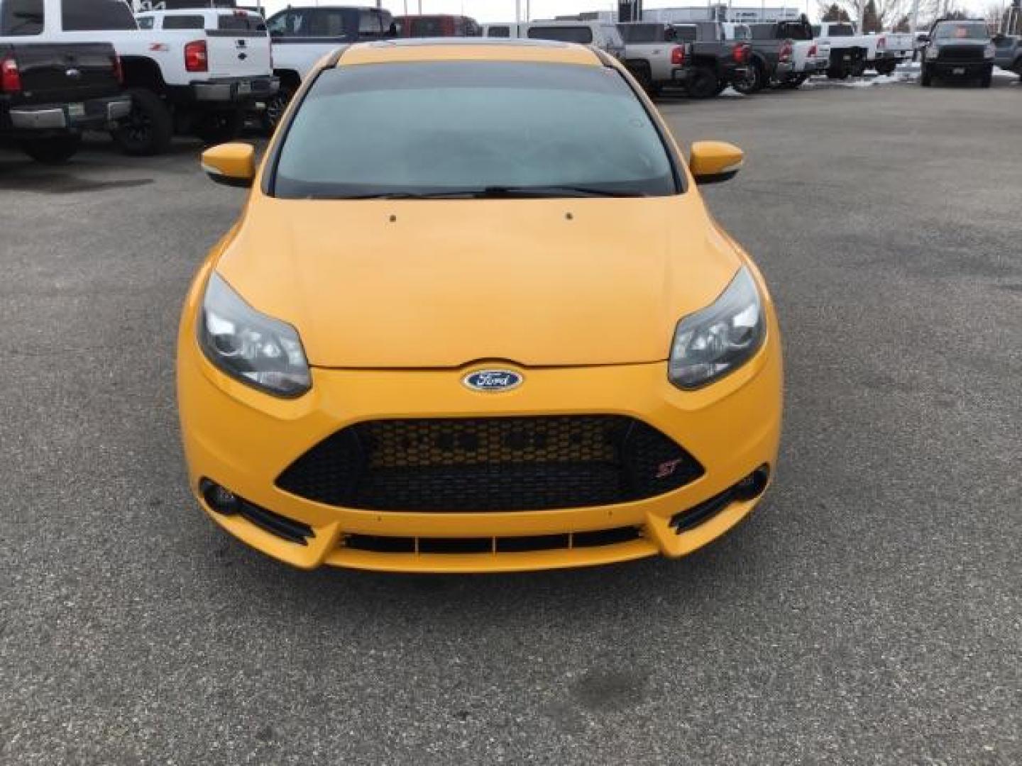 2014 YELLOW /Charcoal Black Ford Focus ST Hatch (1FADP3L96EL) with an 2.0L L4 DOHC 16V engine, 5-Speed Manual transmission, located at 1235 N Woodruff Ave., Idaho Falls, 83401, (208) 523-1053, 43.507172, -112.000488 - This 2014 Ford Focus ST, has 82,000 miles. It has a manual transmission. Comes with Leather interior, heated seats, sunroof, blue tooth audio, touch screen stereo, cruise control, power windows and locks. At Timberline Auto it is always easy to find a great deal on your next vehicle! Our experience - Photo#8