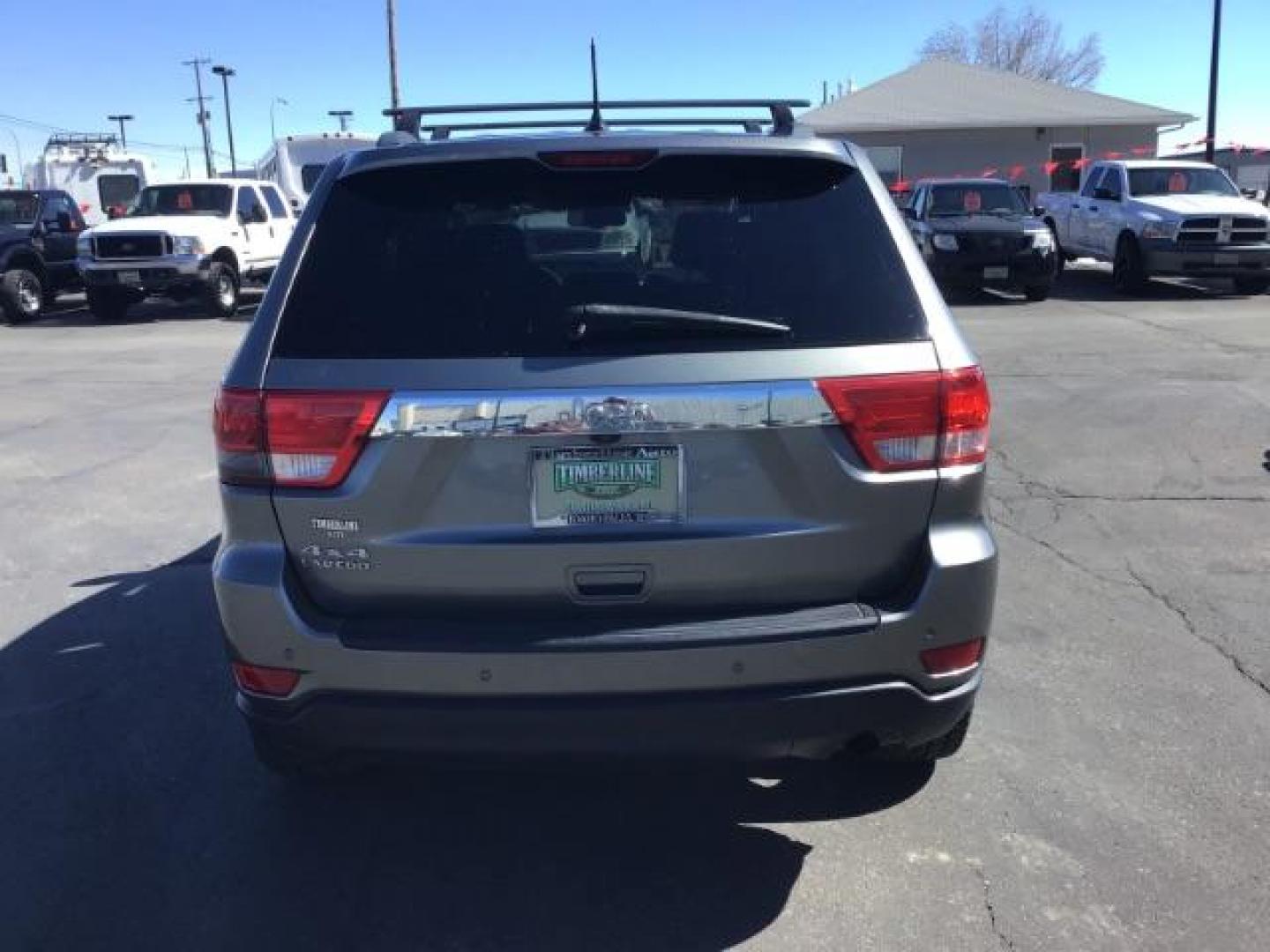 2013 Jeep Grand Cherokee SPORT UTILITY 4-DR (1C4RJFAG5DC) with an 3.6L V6 DOHC 24V engine, 5-Speed Automatic transmission, located at 1235 N Woodruff Ave., Idaho Falls, 83401, (208) 523-1053, 43.507172, -112.000488 - This Jeep Grand Cherokee Laredo 4x4 , has the 3.2L V6 motor. It has 150,000 miles. It comes with leather interior, cruise control, back up camera, powered seats, and power windows and locks. At Timberline Auto it is always easy to find a great deal on your next vehicle! Our experienced sales staff c - Photo#3