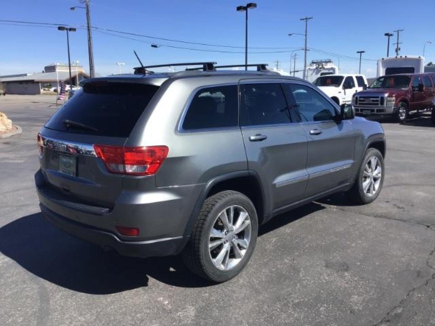 2013 Jeep Grand Cherokee SPORT UTILITY 4-DR (1C4RJFAG5DC) with an 3.6L V6 DOHC 24V engine, 5-Speed Automatic transmission, located at 1235 N Woodruff Ave., Idaho Falls, 83401, (208) 523-1053, 43.507172, -112.000488 - This Jeep Grand Cherokee Laredo 4x4 , has the 3.2L V6 motor. It has 150,000 miles. It comes with leather interior, cruise control, back up camera, powered seats, and power windows and locks. At Timberline Auto it is always easy to find a great deal on your next vehicle! Our experienced sales staff c - Photo#4