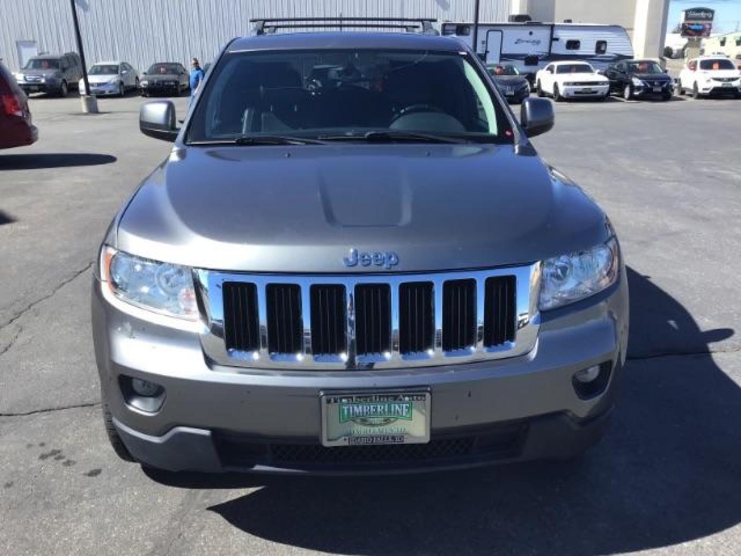 2013 Jeep Grand Cherokee SPORT UTILITY 4-DR (1C4RJFAG5DC) with an 3.6L V6 DOHC 24V engine, 5-Speed Automatic transmission, located at 1235 N Woodruff Ave., Idaho Falls, 83401, (208) 523-1053, 43.507172, -112.000488 - This Jeep Grand Cherokee Laredo 4x4 , has the 3.2L V6 motor. It has 150,000 miles. It comes with leather interior, cruise control, back up camera, powered seats, and power windows and locks. At Timberline Auto it is always easy to find a great deal on your next vehicle! Our experienced sales staff c - Photo#7