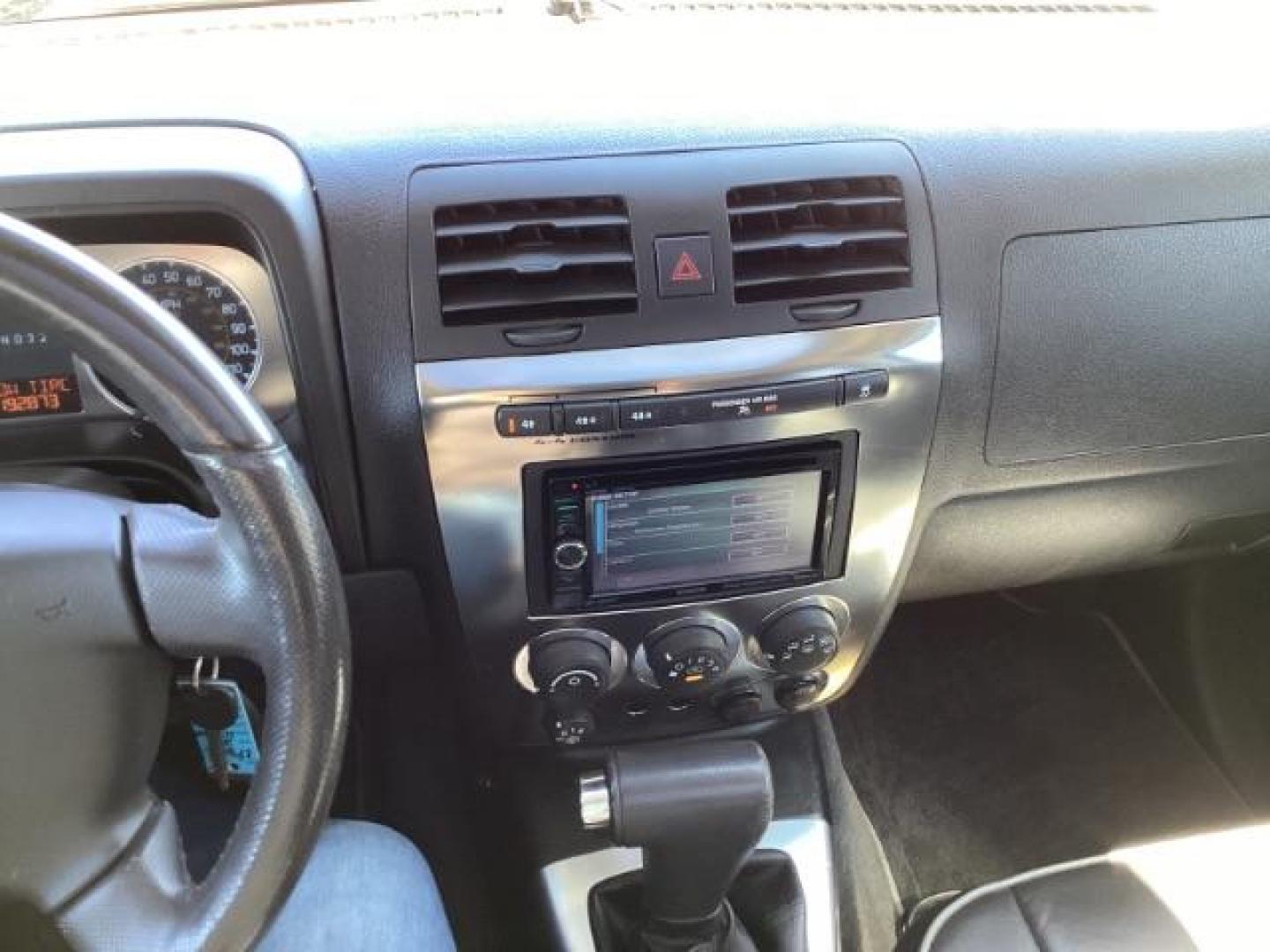 2006 Boulder Gray Metallic /Ebony Leather Interior Hummer H3 Sport Utility (5GTDN136268) with an 3.5L L5 DOHC 20V engine, 4-Speed Automatic transmission, located at 1235 N Woodruff Ave., Idaho Falls, 83401, (208) 523-1053, 43.507172, -112.000488 - The 2006 Hummer H3 was part of the Hummer lineup known for its rugged design and off-road capabilities. Here are some of its key features: Exterior Design: The H3 retained the iconic boxy design of the Hummer brand, with a rugged and aggressive appearance. It featured a wide stance and prominent wh - Photo#10