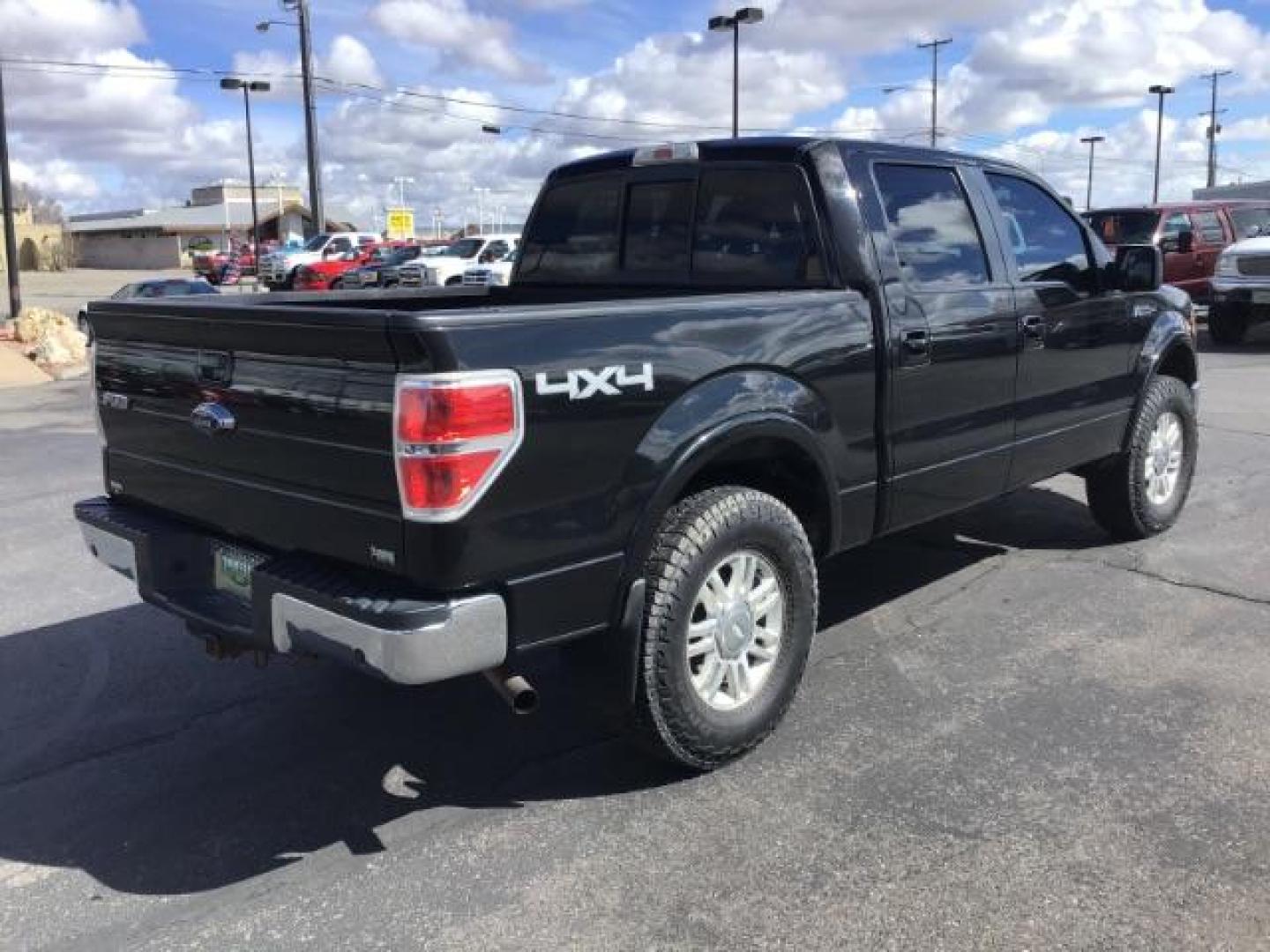 2010 BLACK /Medium Stone Leather Interior Ford F-150 Lariat SuperCrew 5.5-ft. Bed 4WD (1FTFW1EV2AK) with an 5.4L V8 SOHC 24V FFV engine, 4-Speed Automatic transmission, located at 1235 N Woodruff Ave., Idaho Falls, 83401, (208) 523-1053, 43.507172, -112.000488 - Photo#4