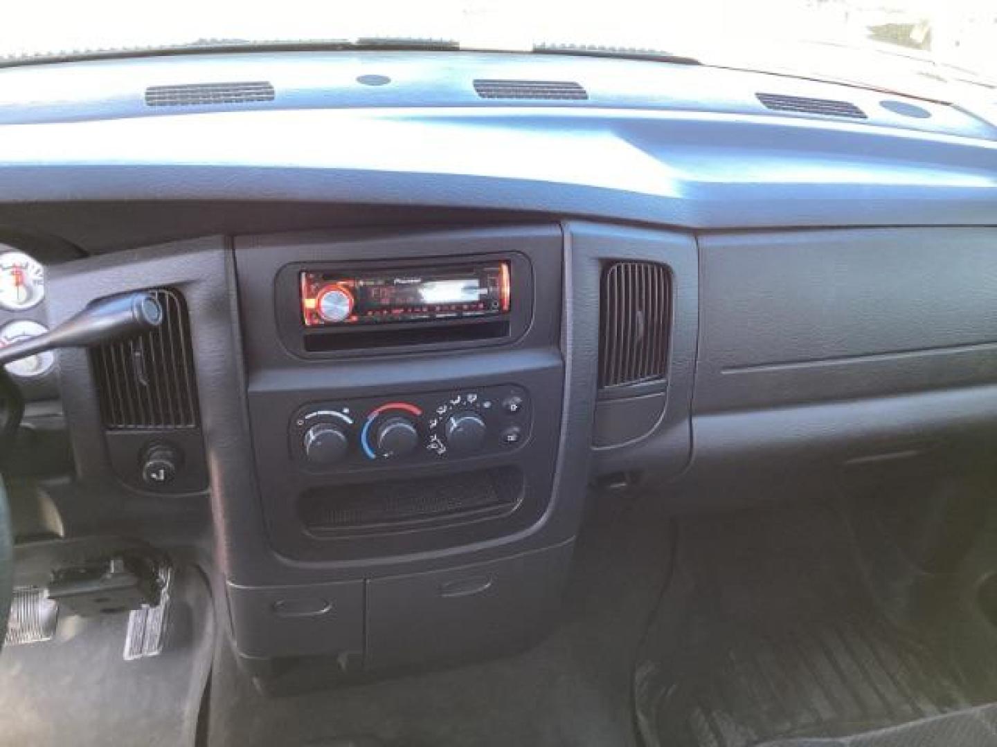 2004 Flame Red /Dark Slate Gray Leather Interior Dodge Ram 2500 SLT Quad Cab 4WD (3D7KU28CX4G) with an 5.9L L6 OHV 24V TURBO DIESEL engine, 5-Speed Automatic transmission, located at 1235 N Woodruff Ave., Idaho Falls, 83401, (208) 523-1053, 43.507172, -112.000488 - The 2004 Dodge Ram 2500 Quad Cab SLT Diesel is a robust and capable truck known for its towing capacity and durability. Here are some of the key features you might find on this model: Engine: Equipped with a powerful and torquey Cummins 5.9-liter inline-six turbocharged diesel engine, known for its - Photo#10