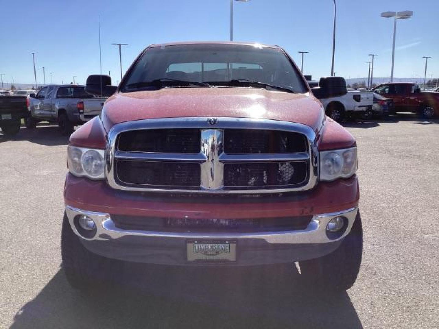 2004 Flame Red /Dark Slate Gray Leather Interior Dodge Ram 2500 SLT Quad Cab 4WD (3D7KU28CX4G) with an 5.9L L6 OHV 24V TURBO DIESEL engine, 5-Speed Automatic transmission, located at 1235 N Woodruff Ave., Idaho Falls, 83401, (208) 523-1053, 43.507172, -112.000488 - The 2004 Dodge Ram 2500 Quad Cab SLT Diesel is a robust and capable truck known for its towing capacity and durability. Here are some of the key features you might find on this model: Engine: Equipped with a powerful and torquey Cummins 5.9-liter inline-six turbocharged diesel engine, known for its - Photo#7