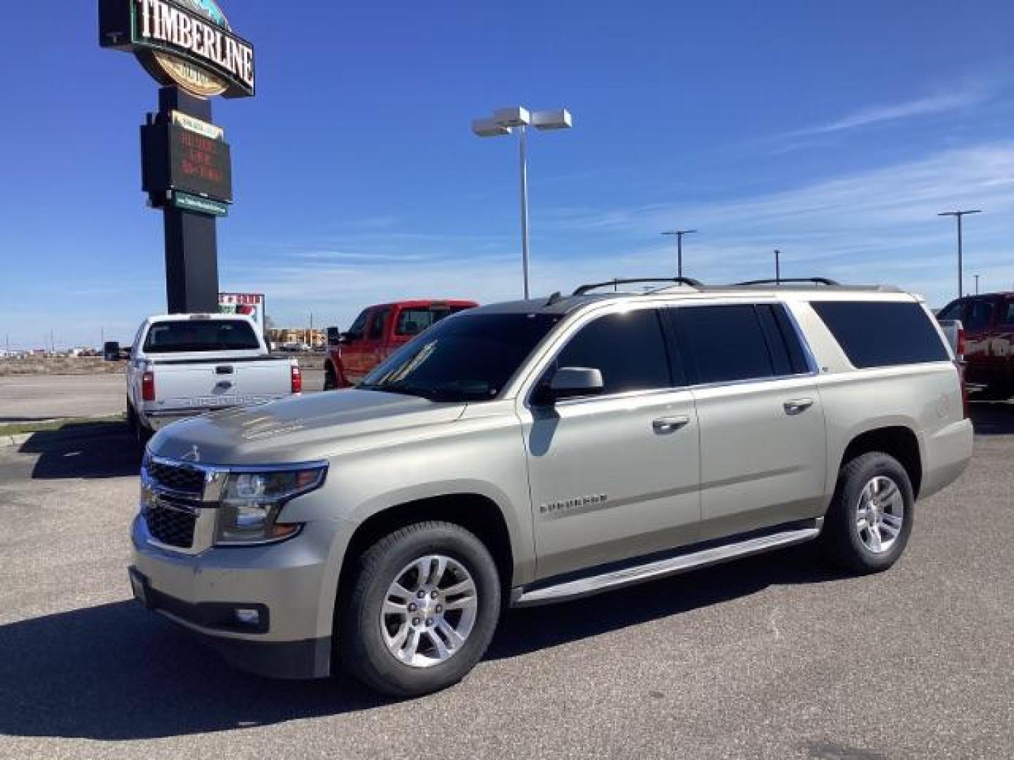 2015 SILVER /LEATHER Chevrolet Suburban LT 1500 4WD (1GNSKJKC5FR) with an 5.3L V8 OHV 16V engine, 6-Speed Automatic transmission, located at 1235 N Woodruff Ave., Idaho Falls, 83401, (208) 523-1053, 43.507172, -112.000488 - The 2015 Chevrolet Suburban LT is a well-equipped trim level of the full-size SUV, offering a range of features designed to provide comfort, convenience, safety, and performance. Here are some of the notable features you might find on the 2015 Chevy Suburban LT: V8 Engine: The Suburban LT typically - Photo#0