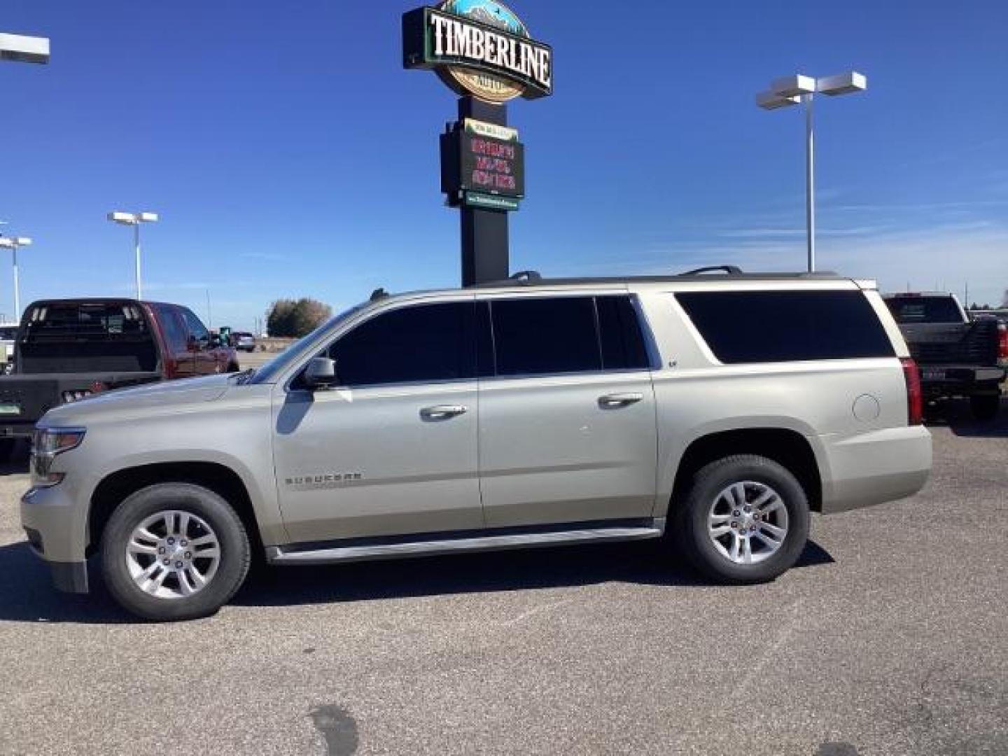 2015 SILVER /LEATHER Chevrolet Suburban LT 1500 4WD (1GNSKJKC5FR) with an 5.3L V8 OHV 16V engine, 6-Speed Automatic transmission, located at 1235 N Woodruff Ave., Idaho Falls, 83401, (208) 523-1053, 43.507172, -112.000488 - The 2015 Chevrolet Suburban LT is a well-equipped trim level of the full-size SUV, offering a range of features designed to provide comfort, convenience, safety, and performance. Here are some of the notable features you might find on the 2015 Chevy Suburban LT: V8 Engine: The Suburban LT typically - Photo#1