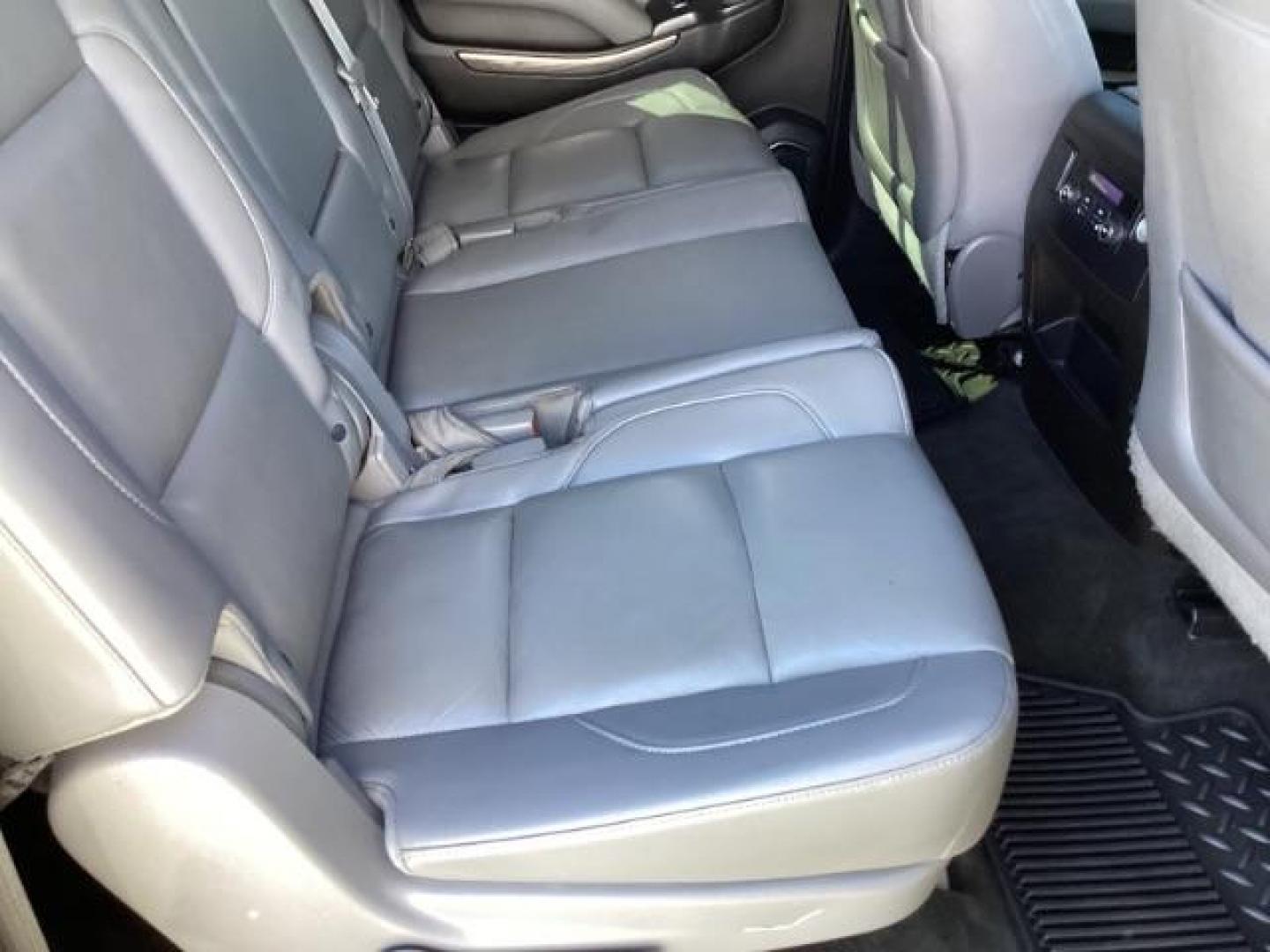 2015 SILVER /LEATHER Chevrolet Suburban LT 1500 4WD (1GNSKJKC5FR) with an 5.3L V8 OHV 16V engine, 6-Speed Automatic transmission, located at 1235 N Woodruff Ave., Idaho Falls, 83401, (208) 523-1053, 43.507172, -112.000488 - The 2015 Chevrolet Suburban LT is a well-equipped trim level of the full-size SUV, offering a range of features designed to provide comfort, convenience, safety, and performance. Here are some of the notable features you might find on the 2015 Chevy Suburban LT: V8 Engine: The Suburban LT typically - Photo#20