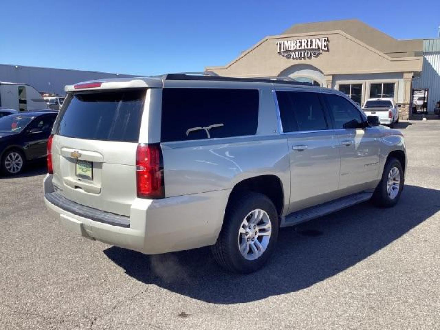 2015 SILVER /LEATHER Chevrolet Suburban LT 1500 4WD (1GNSKJKC5FR) with an 5.3L V8 OHV 16V engine, 6-Speed Automatic transmission, located at 1235 N Woodruff Ave., Idaho Falls, 83401, (208) 523-1053, 43.507172, -112.000488 - The 2015 Chevrolet Suburban LT is a well-equipped trim level of the full-size SUV, offering a range of features designed to provide comfort, convenience, safety, and performance. Here are some of the notable features you might find on the 2015 Chevy Suburban LT: V8 Engine: The Suburban LT typically - Photo#4