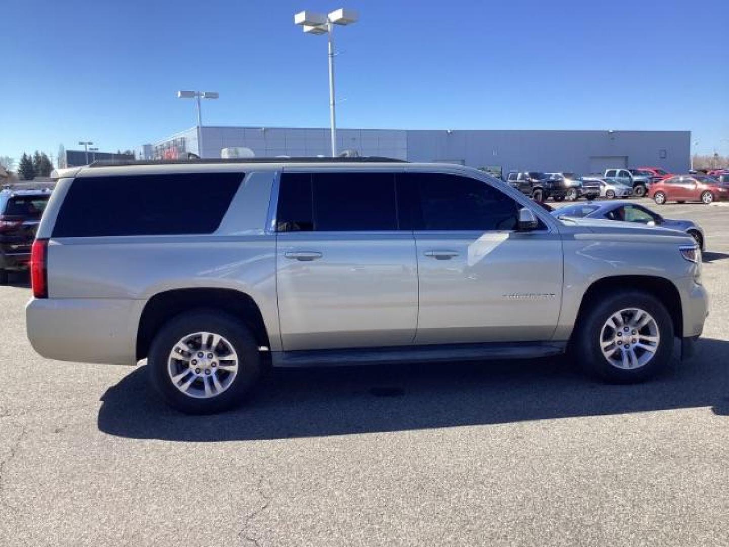 2015 SILVER /LEATHER Chevrolet Suburban LT 1500 4WD (1GNSKJKC5FR) with an 5.3L V8 OHV 16V engine, 6-Speed Automatic transmission, located at 1235 N Woodruff Ave., Idaho Falls, 83401, (208) 523-1053, 43.507172, -112.000488 - The 2015 Chevrolet Suburban LT is a well-equipped trim level of the full-size SUV, offering a range of features designed to provide comfort, convenience, safety, and performance. Here are some of the notable features you might find on the 2015 Chevy Suburban LT: V8 Engine: The Suburban LT typically - Photo#5