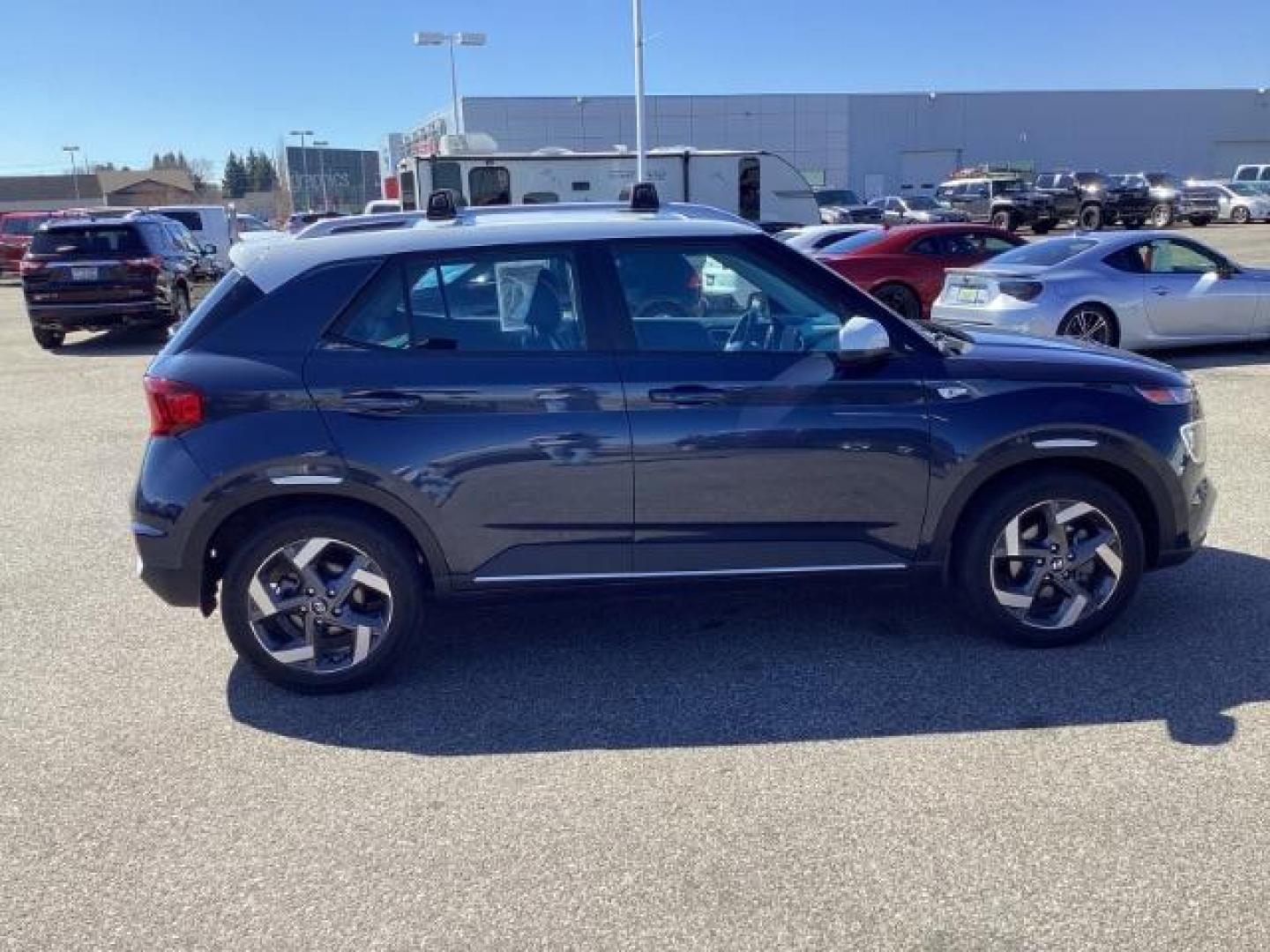 2021 Intense Blue /Black Hyundai Venue SEL (KMHRC8A36MU) with an 1.6L L4 DOHC 16V engine, Continuously Variable Transmission transmission, located at 1235 N Woodruff Ave., Idaho Falls, 83401, (208) 523-1053, 43.507172, -112.000488 - The 2021 Hyundai Venue Denim is a unique trim level of the Venue, Hyundai's subcompact SUV. The Denim trim offers several features and styling elements that set it apart from other trims. Here are some of the notable features you might find on the 2021 Hyundai Venue Denim: Denim Exterior Color: The - Photo#4