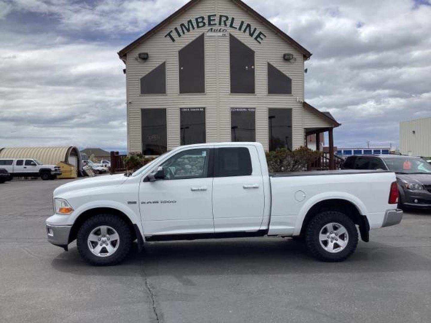 2012 RAM 1500 SLT Quad Cab 4WD (1C6RD7GT7CS) with an 5.7L V8 OHV 16V engine, 5-Speed Automatic transmission, located at 1235 N Woodruff Ave., Idaho Falls, 83401, (208) 523-1053, 43.507172, -112.000488 - The 2012 RAM 1500 SLT with the HEMI engine comes with a range of features that make it a capable and comfortable truck. Here are some of the key features you might find on this model: Engine: The standout feature is the powerful 5.7-liter HEMI V8 engine, known for its robust performance and towing - Photo#1