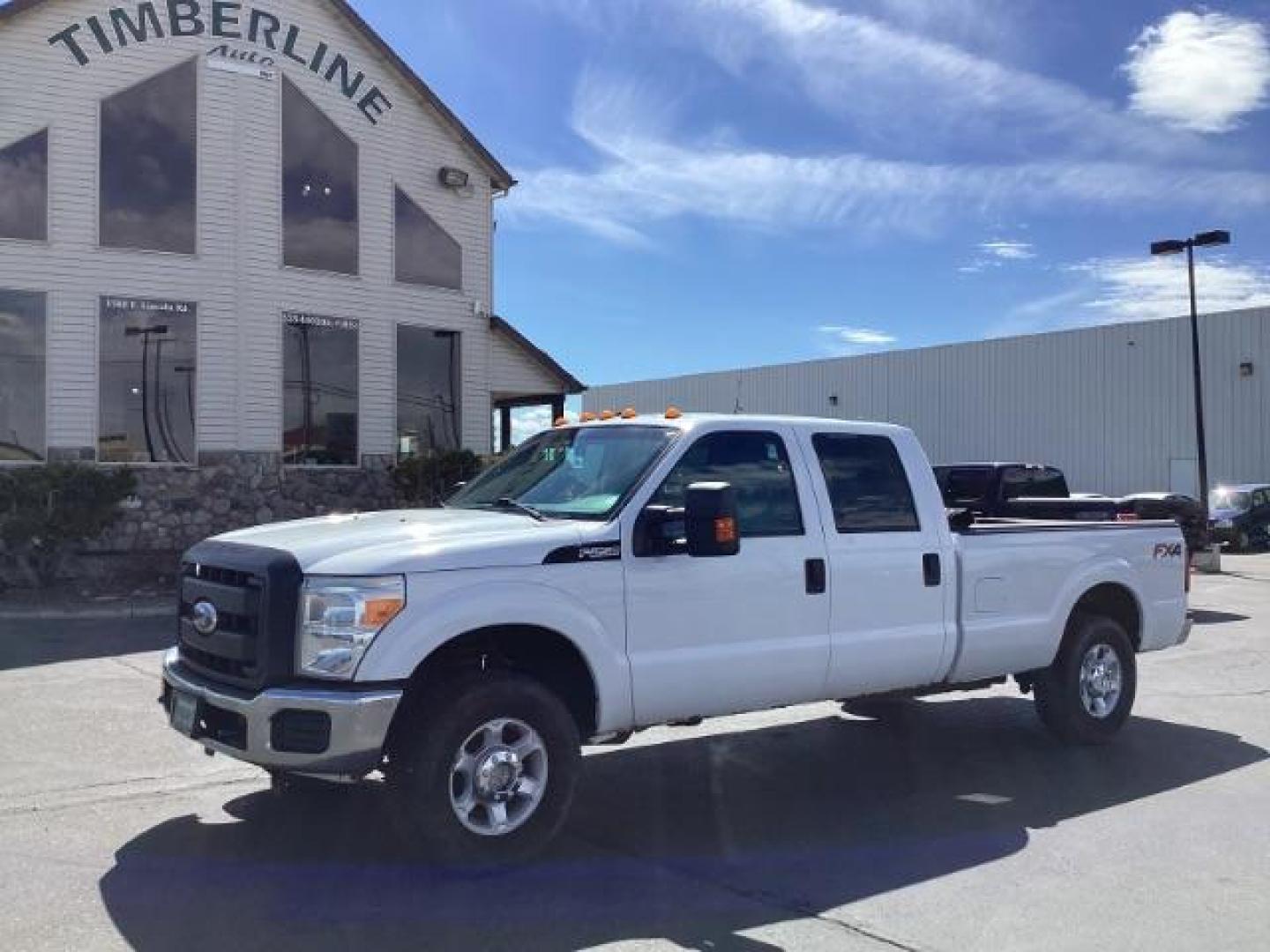 2012 Oxford White /Steel Cloth Interior Ford F-250 SD XL Crew Cab Long Bed 4WD (1FT7W2B64CE) with an 6.2L V8 OHV 16V engine, 6-Speed Automatic transmission, located at 1235 N Woodruff Ave., Idaho Falls, 83401, (208) 523-1053, 43.507172, -112.000488 - The 2011 Ford F-250 XL is a sturdy and capable truck designed for heavy-duty work. Here are the key features you can expect to find in the gas-powered XL trim: Engine Option: 6.2-liter V8 engine producing around 385 horsepower and 405 lb-ft of torque. Transmission: Most models come with a six-spe - Photo#0