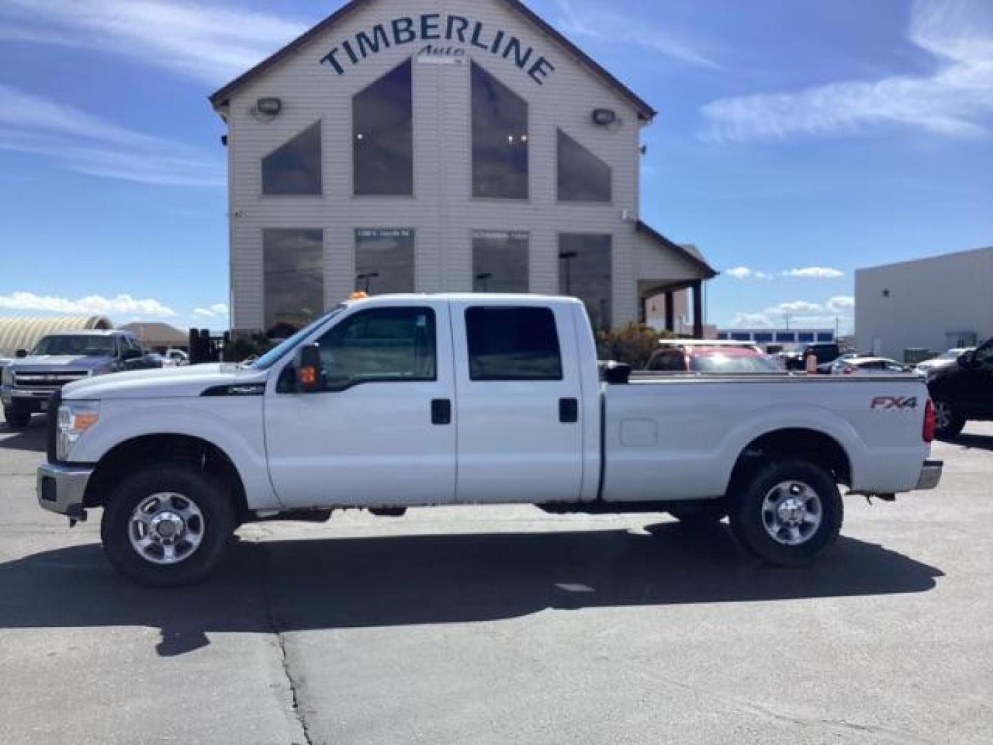 2012 Oxford White /Steel Cloth Interior Ford F-250 SD XL Crew Cab Long Bed 4WD (1FT7W2B64CE) with an 6.2L V8 OHV 16V engine, 6-Speed Automatic transmission, located at 1235 N Woodruff Ave., Idaho Falls, 83401, (208) 523-1053, 43.507172, -112.000488 - The 2011 Ford F-250 XL is a sturdy and capable truck designed for heavy-duty work. Here are the key features you can expect to find in the gas-powered XL trim: Engine Option: 6.2-liter V8 engine producing around 385 horsepower and 405 lb-ft of torque. Transmission: Most models come with a six-spe - Photo#1