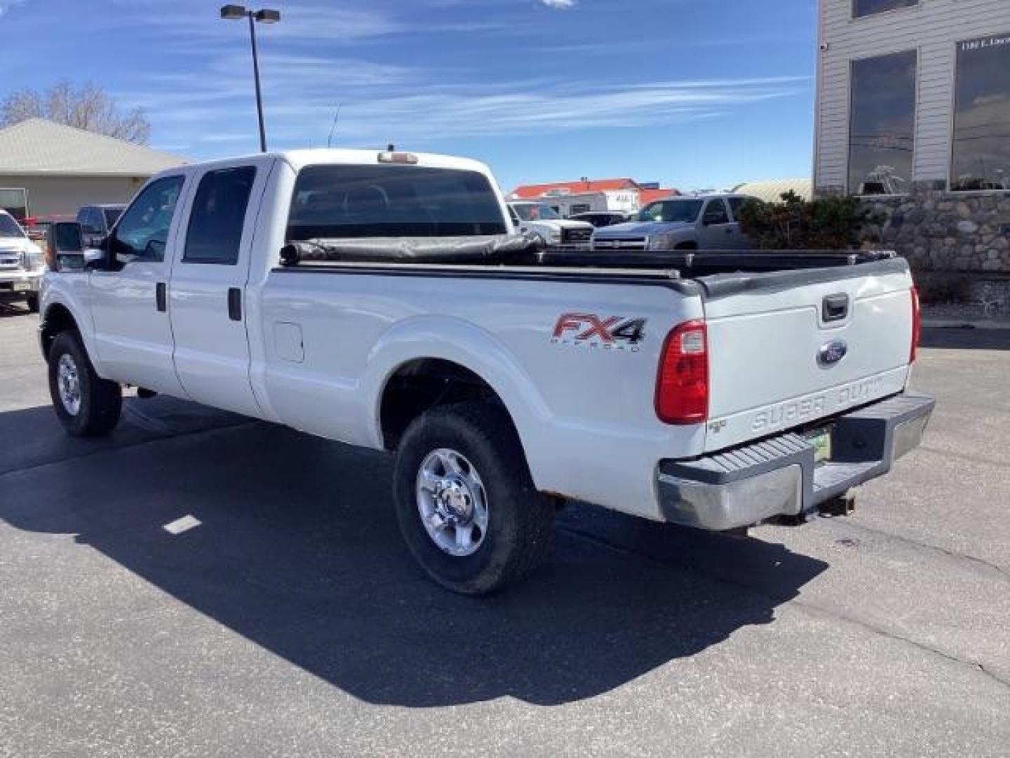 2012 Oxford White /Steel Cloth Interior Ford F-250 SD XL Crew Cab Long Bed 4WD (1FT7W2B64CE) with an 6.2L V8 OHV 16V engine, 6-Speed Automatic transmission, located at 1235 N Woodruff Ave., Idaho Falls, 83401, (208) 523-1053, 43.507172, -112.000488 - The 2011 Ford F-250 XL is a sturdy and capable truck designed for heavy-duty work. Here are the key features you can expect to find in the gas-powered XL trim: Engine Option: 6.2-liter V8 engine producing around 385 horsepower and 405 lb-ft of torque. Transmission: Most models come with a six-spe - Photo#2