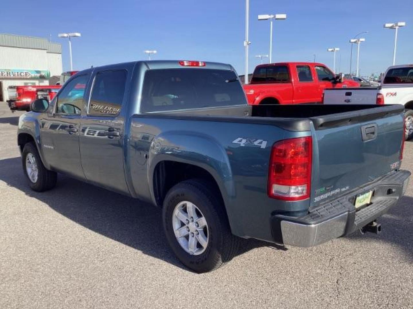 2011 Midnight Blue Metallic /Ebony Cloth Interior GMC Sierra 1500 SLE Crew Cab 4WD (3GTP2VE36BG) with an 5.3L V8 OHV 16V FFV engine, 6-Speed Automatic transmission, located at 1235 N Woodruff Ave., Idaho Falls, 83401, (208) 523-1053, 43.507172, -112.000488 - Photo#2