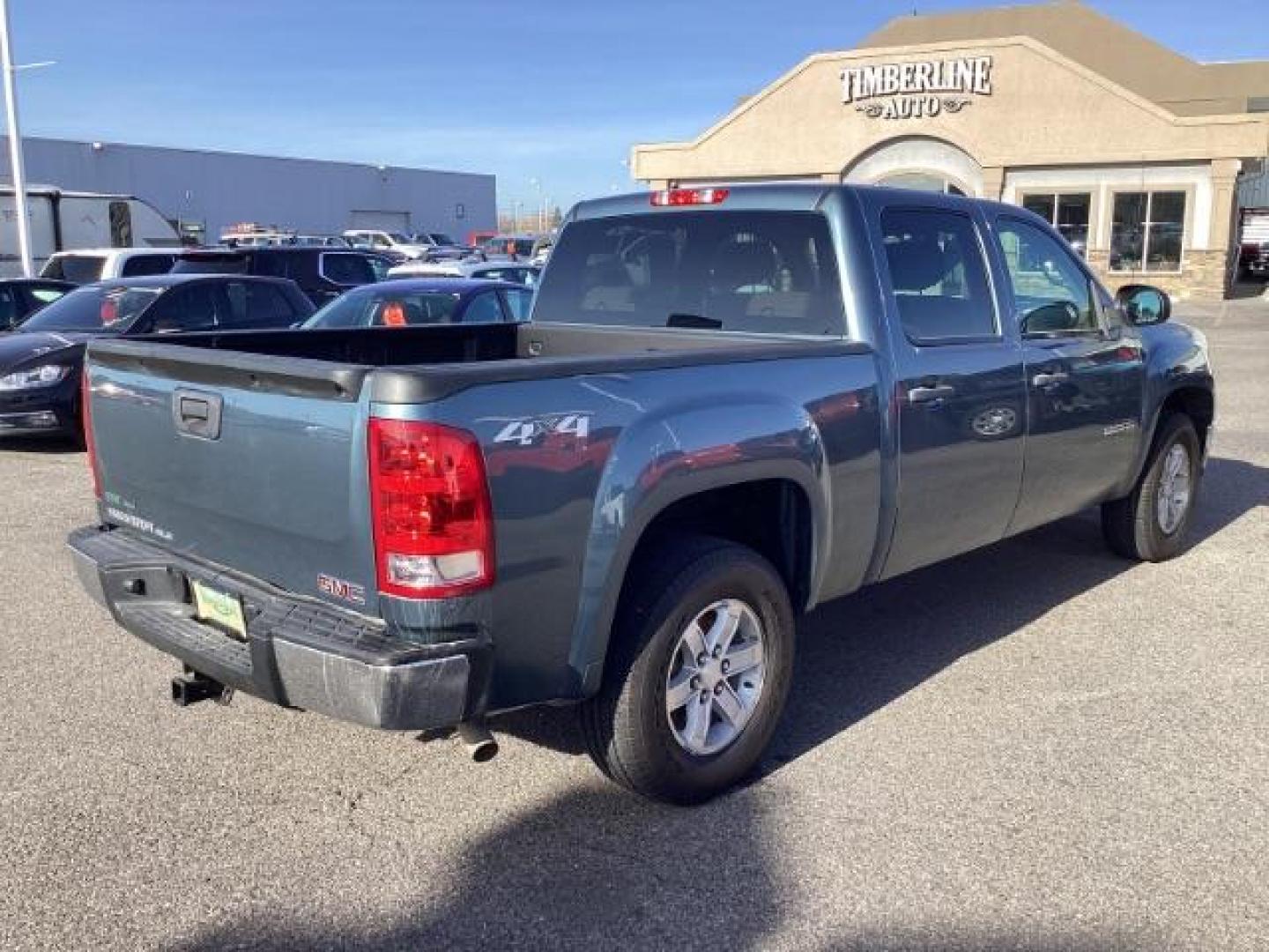 2011 Midnight Blue Metallic /Ebony Cloth Interior GMC Sierra 1500 SLE Crew Cab 4WD (3GTP2VE36BG) with an 5.3L V8 OHV 16V FFV engine, 6-Speed Automatic transmission, located at 1235 N Woodruff Ave., Idaho Falls, 83401, (208) 523-1053, 43.507172, -112.000488 - Photo#4