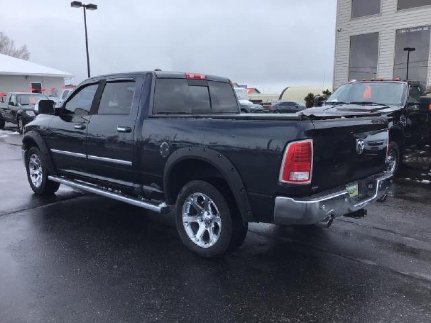 2014 RAM 1500 Laramie Crew Cab LWB 4WD (1C6RR7VT8ES) with an 5.7L V8 OHV 16V engine, 8-Speed Automatic transmission, located at 1235 N Woodruff Ave., Idaho Falls, 83401, (208) 523-1053, 43.507172, -112.000488 - This 2014 Ram 1500 Laramie 4x4, has 201,000 miles. It comes with leather interior, push button start, sunroof, blue tooth audio, back up camera, heated seats and heated steering wheel. At Timberline Auto it is always easy to find a great deal on your next vehicle! Our experienced sales staff can hel - Photo#2