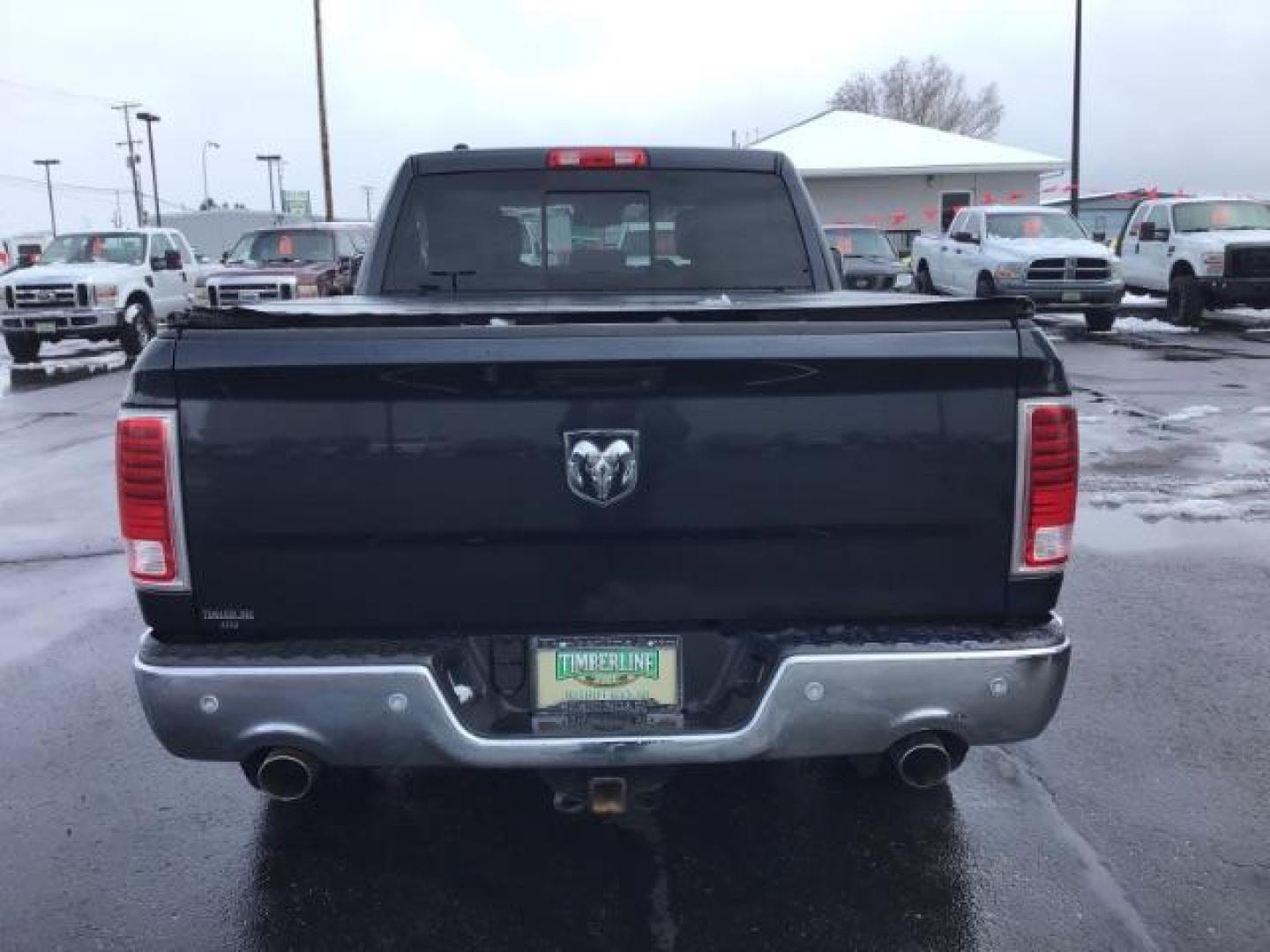 2014 RAM 1500 Laramie Crew Cab LWB 4WD (1C6RR7VT8ES) with an 5.7L V8 OHV 16V engine, 8-Speed Automatic transmission, located at 1235 N Woodruff Ave., Idaho Falls, 83401, (208) 523-1053, 43.507172, -112.000488 - This 2014 Ram 1500 Laramie 4x4, has 201,000 miles. It comes with leather interior, push button start, sunroof, blue tooth audio, back up camera, heated seats and heated steering wheel. At Timberline Auto it is always easy to find a great deal on your next vehicle! Our experienced sales staff can hel - Photo#3