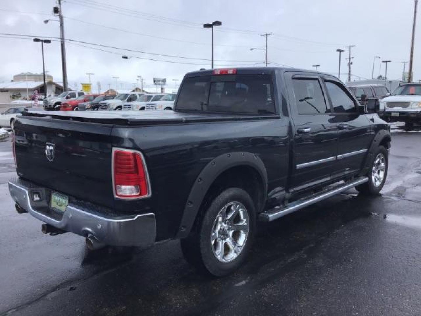 2014 RAM 1500 Laramie Crew Cab LWB 4WD (1C6RR7VT8ES) with an 5.7L V8 OHV 16V engine, 8-Speed Automatic transmission, located at 1235 N Woodruff Ave., Idaho Falls, 83401, (208) 523-1053, 43.507172, -112.000488 - This 2014 Ram 1500 Laramie 4x4, has 201,000 miles. It comes with leather interior, push button start, sunroof, blue tooth audio, back up camera, heated seats and heated steering wheel. At Timberline Auto it is always easy to find a great deal on your next vehicle! Our experienced sales staff can hel - Photo#4