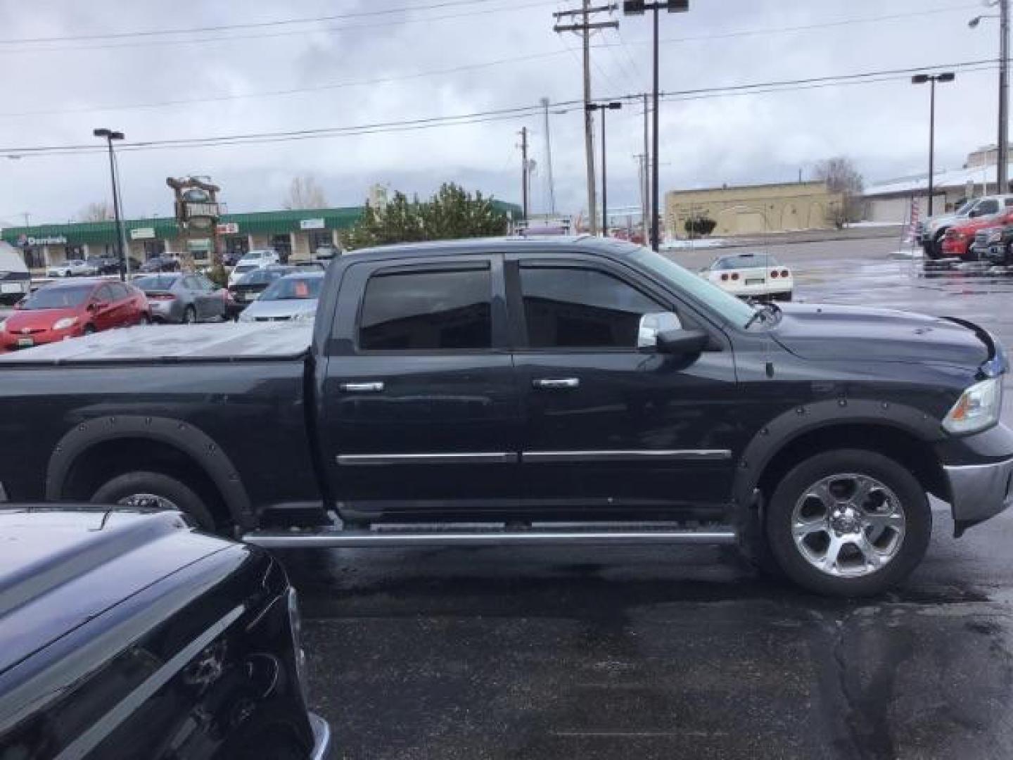 2014 RAM 1500 Laramie Crew Cab LWB 4WD (1C6RR7VT8ES) with an 5.7L V8 OHV 16V engine, 8-Speed Automatic transmission, located at 1235 N Woodruff Ave., Idaho Falls, 83401, (208) 523-1053, 43.507172, -112.000488 - This 2014 Ram 1500 Laramie 4x4, has 201,000 miles. It comes with leather interior, push button start, sunroof, blue tooth audio, back up camera, heated seats and heated steering wheel. At Timberline Auto it is always easy to find a great deal on your next vehicle! Our experienced sales staff can hel - Photo#5