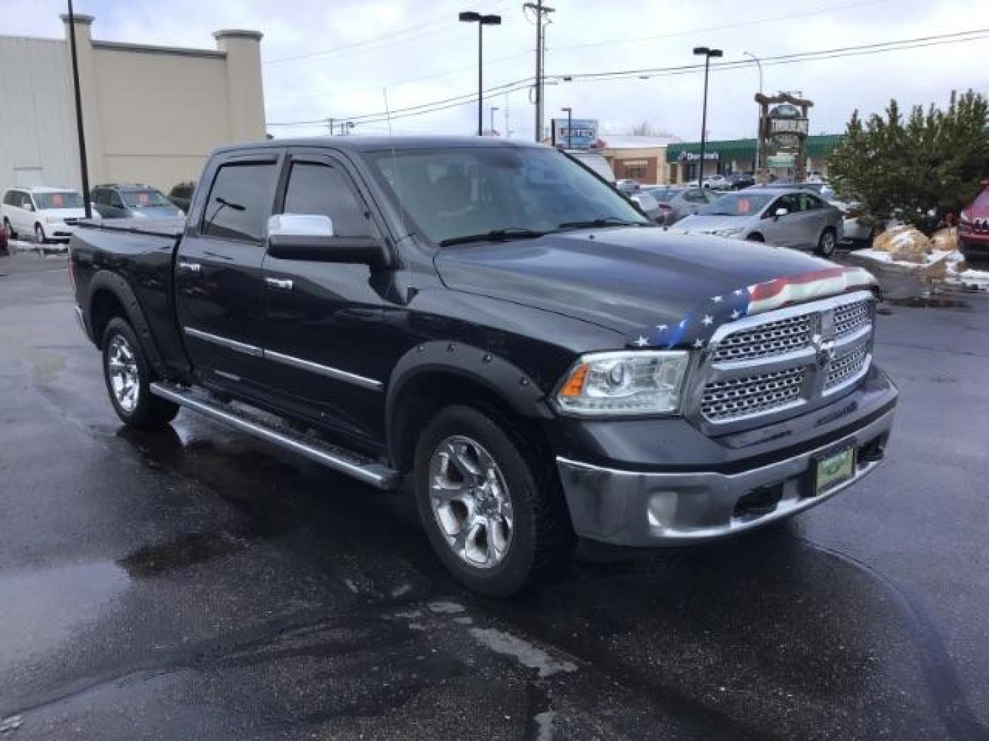 2014 RAM 1500 Laramie Crew Cab LWB 4WD (1C6RR7VT8ES) with an 5.7L V8 OHV 16V engine, 8-Speed Automatic transmission, located at 1235 N Woodruff Ave., Idaho Falls, 83401, (208) 523-1053, 43.507172, -112.000488 - This 2014 Ram 1500 Laramie 4x4, has 201,000 miles. It comes with leather interior, push button start, sunroof, blue tooth audio, back up camera, heated seats and heated steering wheel. At Timberline Auto it is always easy to find a great deal on your next vehicle! Our experienced sales staff can hel - Photo#6