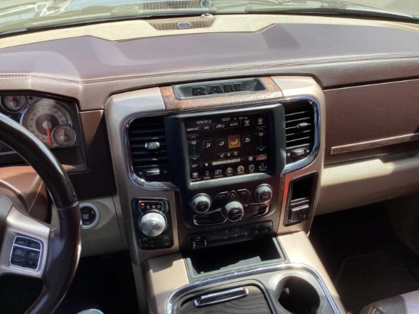 2017 BLACK /Black/Cattle Tan, premium leather RAM 1500 Longhorn Crew Cab SWB 4WD (1C6RR7PT9HS) with an 5.7L V8 OHV 16V engine, 8-Speed Automatic transmission, located at 1235 N Woodruff Ave., Idaho Falls, 83401, (208) 523-1053, 43.507172, -112.000488 - The 2017 Ram 1500 Laramie Longhorn with the 5.7-liter HEMI V8 engine offers a blend of luxury, capability, and performance. Here are the key features you might find on this specific configuration: Does have a rebuilt title 5.7-liter HEMI V8 Engine: Produces 395 horsepower and 410 lb-ft of torque, pr - Photo#10