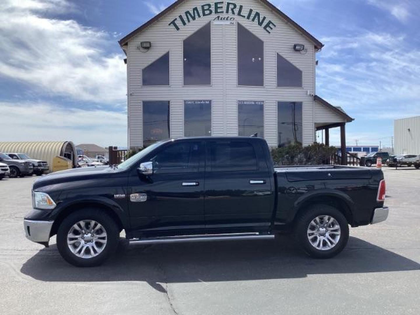 2017 BLACK /Black/Cattle Tan, premium leather RAM 1500 Longhorn Crew Cab SWB 4WD (1C6RR7PT9HS) with an 5.7L V8 OHV 16V engine, 8-Speed Automatic transmission, located at 1235 N Woodruff Ave., Idaho Falls, 83401, (208) 523-1053, 43.507172, -112.000488 - The 2017 Ram 1500 Laramie Longhorn with the 5.7-liter HEMI V8 engine offers a blend of luxury, capability, and performance. Here are the key features you might find on this specific configuration: Does have a rebuilt title 5.7-liter HEMI V8 Engine: Produces 395 horsepower and 410 lb-ft of torque, pr - Photo#1