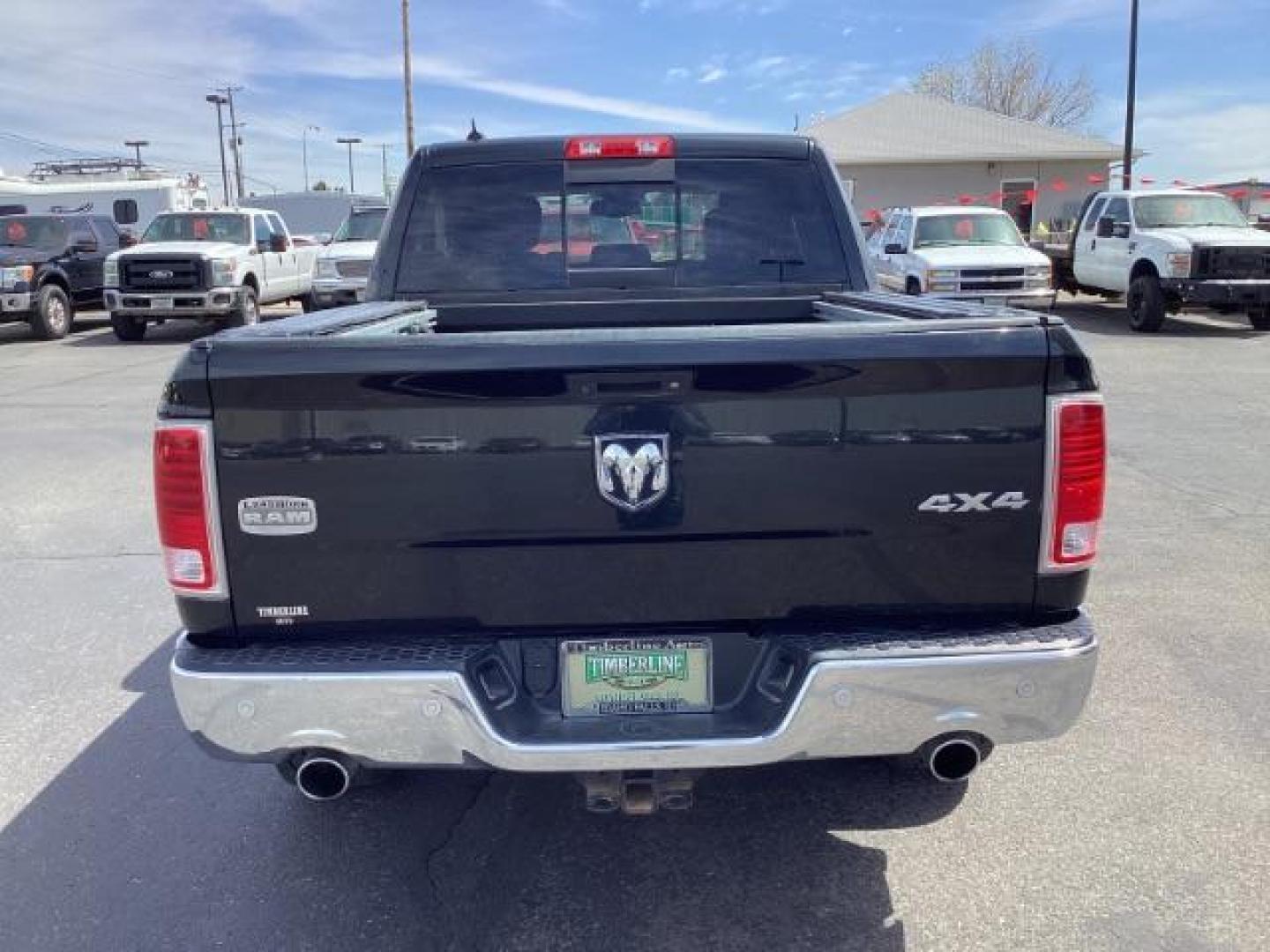 2017 BLACK /Black/Cattle Tan, premium leather RAM 1500 Longhorn Crew Cab SWB 4WD (1C6RR7PT9HS) with an 5.7L V8 OHV 16V engine, 8-Speed Automatic transmission, located at 1235 N Woodruff Ave., Idaho Falls, 83401, (208) 523-1053, 43.507172, -112.000488 - The 2017 Ram 1500 Laramie Longhorn with the 5.7-liter HEMI V8 engine offers a blend of luxury, capability, and performance. Here are the key features you might find on this specific configuration: Does have a rebuilt title 5.7-liter HEMI V8 Engine: Produces 395 horsepower and 410 lb-ft of torque, pr - Photo#3