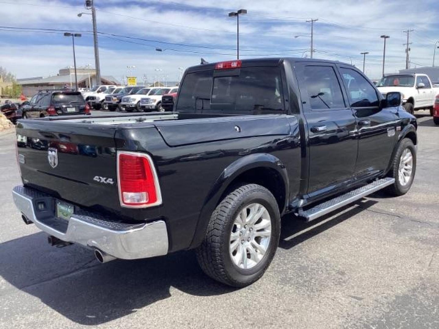 2017 BLACK /Black/Cattle Tan, premium leather RAM 1500 Longhorn Crew Cab SWB 4WD (1C6RR7PT9HS) with an 5.7L V8 OHV 16V engine, 8-Speed Automatic transmission, located at 1235 N Woodruff Ave., Idaho Falls, 83401, (208) 523-1053, 43.507172, -112.000488 - The 2017 Ram 1500 Laramie Longhorn with the 5.7-liter HEMI V8 engine offers a blend of luxury, capability, and performance. Here are the key features you might find on this specific configuration: Does have a rebuilt title 5.7-liter HEMI V8 Engine: Produces 395 horsepower and 410 lb-ft of torque, pr - Photo#4