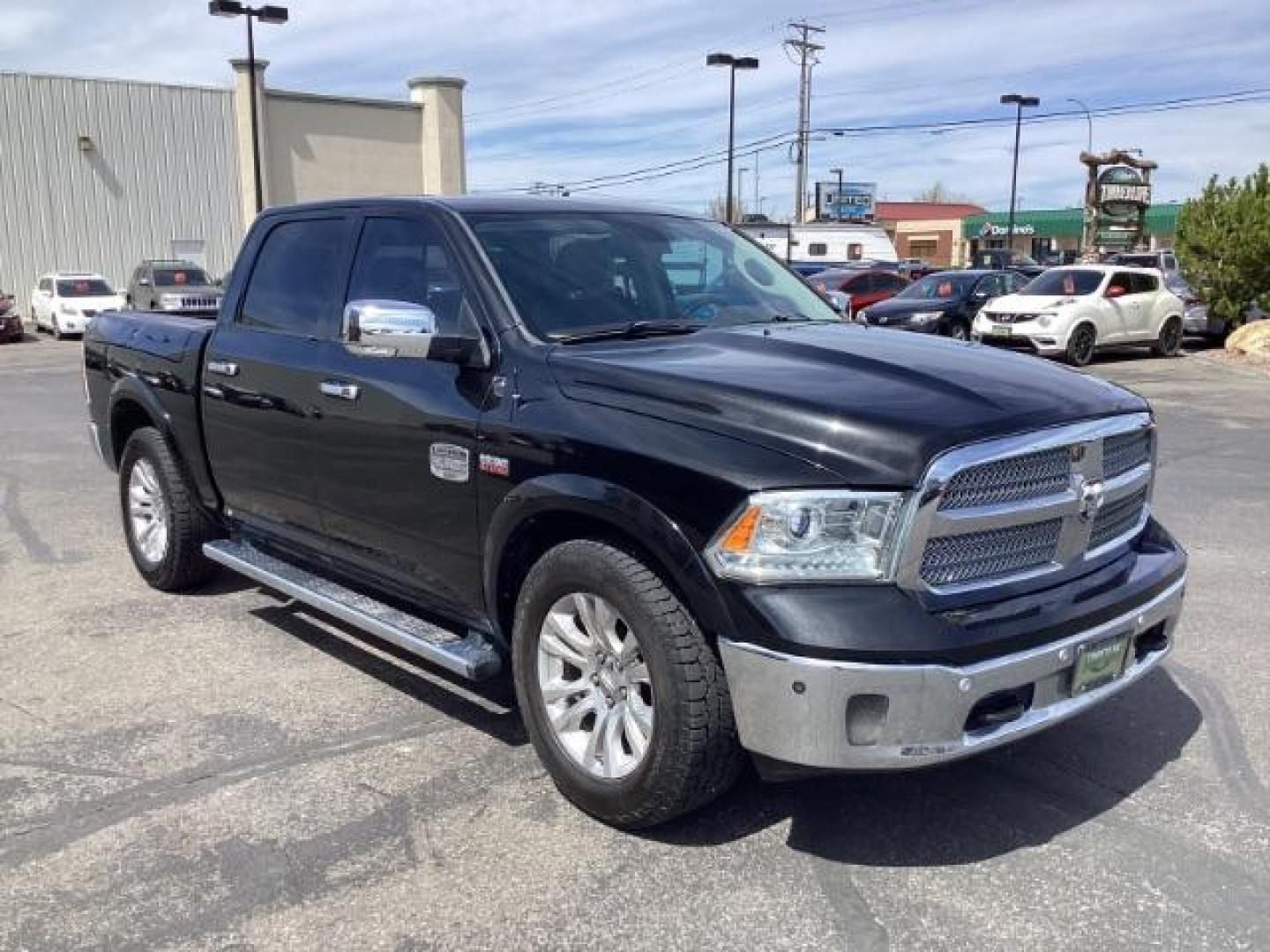 2017 BLACK /Black/Cattle Tan, premium leather RAM 1500 Longhorn Crew Cab SWB 4WD (1C6RR7PT9HS) with an 5.7L V8 OHV 16V engine, 8-Speed Automatic transmission, located at 1235 N Woodruff Ave., Idaho Falls, 83401, (208) 523-1053, 43.507172, -112.000488 - The 2017 Ram 1500 Laramie Longhorn with the 5.7-liter HEMI V8 engine offers a blend of luxury, capability, and performance. Here are the key features you might find on this specific configuration: Does have a rebuilt title 5.7-liter HEMI V8 Engine: Produces 395 horsepower and 410 lb-ft of torque, pr - Photo#6