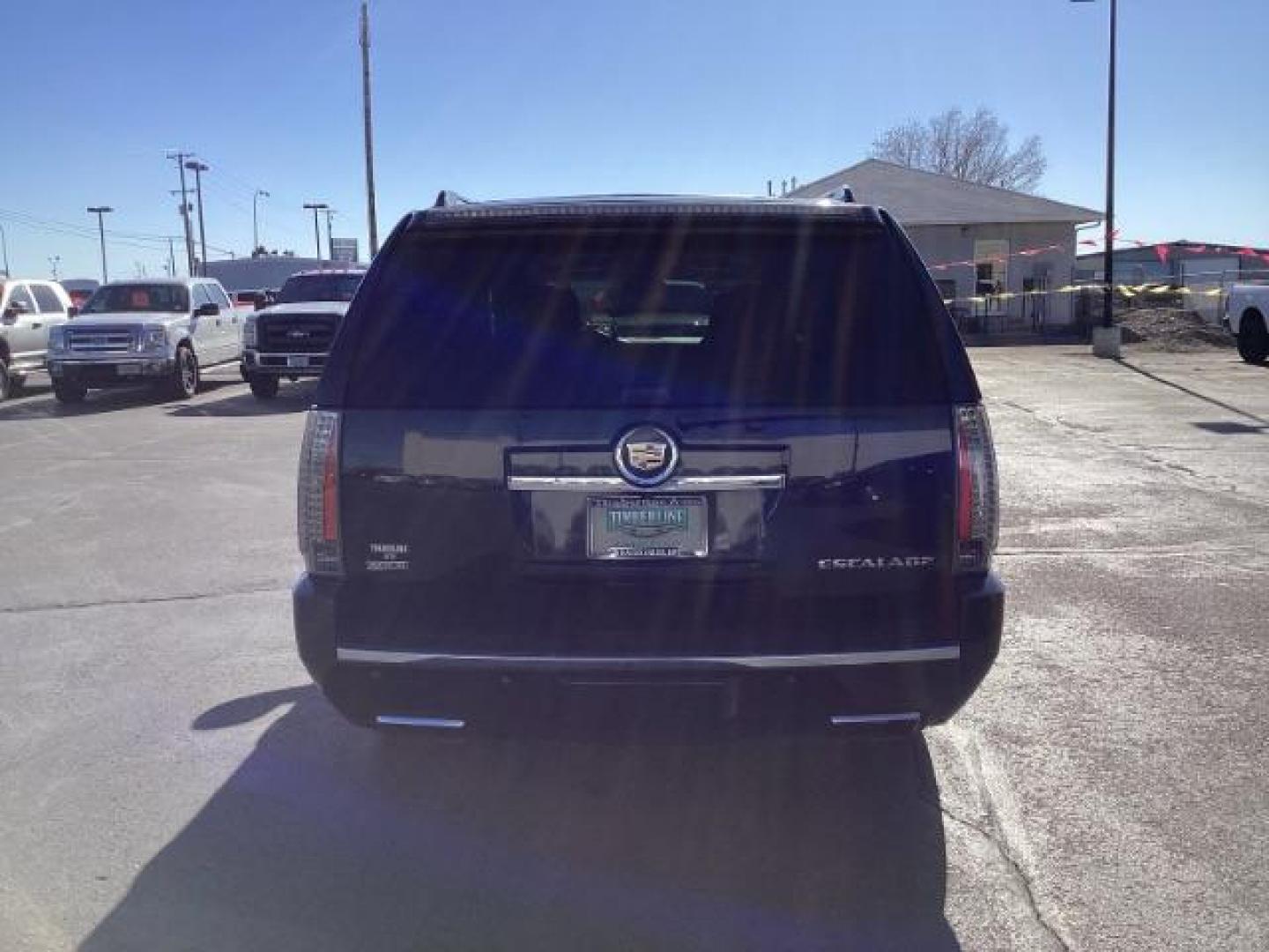 2012 Black Ice Metallic /Ebony Leather Interior Cadillac Escalade ESV AWD Premium (1GYS4JEF7CR) with an 6.2L V8 OHV 16V FFV engine, 6-Speed Automatic transmission, located at 1235 N Woodruff Ave., Idaho Falls, 83401, (208) 523-1053, 43.507172, -112.000488 - The 2012 Cadillac Escalade ESV AWD Premium is a luxurious and spacious full-size SUV that comes loaded with upscale features and amenities. Here are some of the key features you would typically find on the 2012 Cadillac Escalade ESV AWD Premium trim: All-Wheel Drive (AWD): Provides enhanced tractio - Photo#3