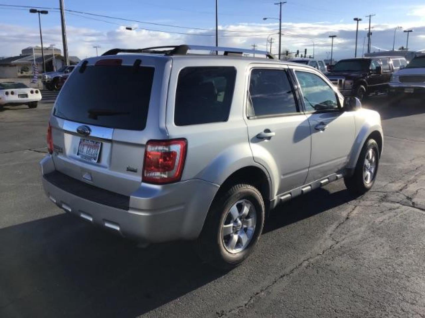 2011 Ingot Silver Metallic /Charcoal Black Leather Interior Ford Escape Limited FWD (1FMCU0EG8BK) with an 3.0L V6 DOHC 24V engine, 6-Speed Automatic transmission, located at 1235 N Woodruff Ave., Idaho Falls, 83401, (208) 523-1053, 43.507172, -112.000488 - This 2011 Ford Escape Limited FWD, has 51,000 miles. Comes with leather interior, heated seats, cruise control, power drivers seat, AM/FM/CD stereo, power windows and locks. At Timberline Auto it is always easy to find a great deal on your next vehicle! Our experienced sales staff can help find the - Photo#4