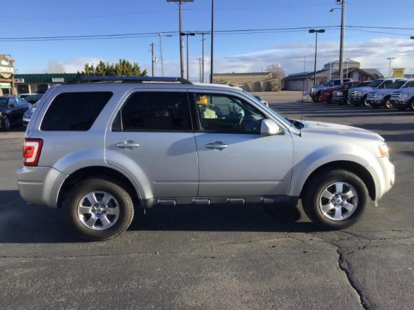 2011 Ingot Silver Metallic /Charcoal Black Leather Interior Ford Escape Limited FWD (1FMCU0EG8BK) with an 3.0L V6 DOHC 24V engine, 6-Speed Automatic transmission, located at 1235 N Woodruff Ave., Idaho Falls, 83401, (208) 523-1053, 43.507172, -112.000488 - This 2011 Ford Escape Limited FWD, has 51,000 miles. Comes with leather interior, heated seats, cruise control, power drivers seat, AM/FM/CD stereo, power windows and locks. At Timberline Auto it is always easy to find a great deal on your next vehicle! Our experienced sales staff can help find the - Photo#5