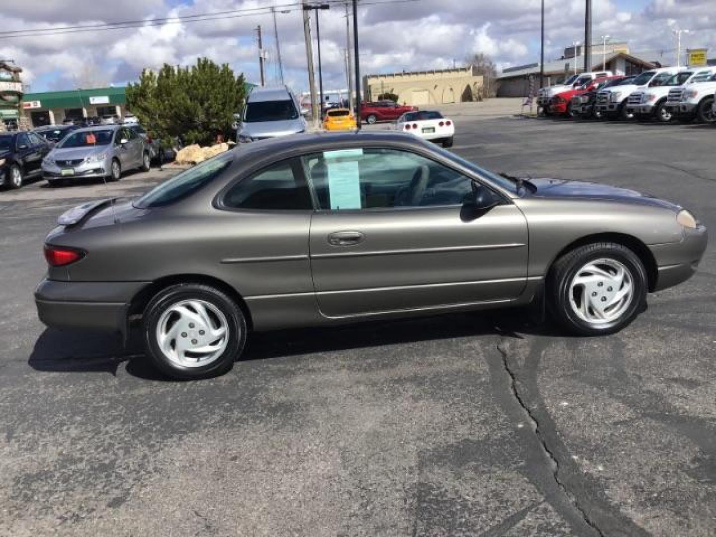 2001 Ford ZX2 Coupe (3FAFP11341R) with an 2.0L L4 DOHC 16V engine, located at 1235 N Woodruff Ave., Idaho Falls, 83401, (208) 523-1053, 43.507172, -112.000488 - At Timberline Auto it is always easy to find a great deal on your next vehicle! Our experienced sales staff can help find the right vehicle will fit your needs. Our knowledgeable finance department has options for almost any credit score. We offer many warranty contract options to protect you new pr - Photo#5