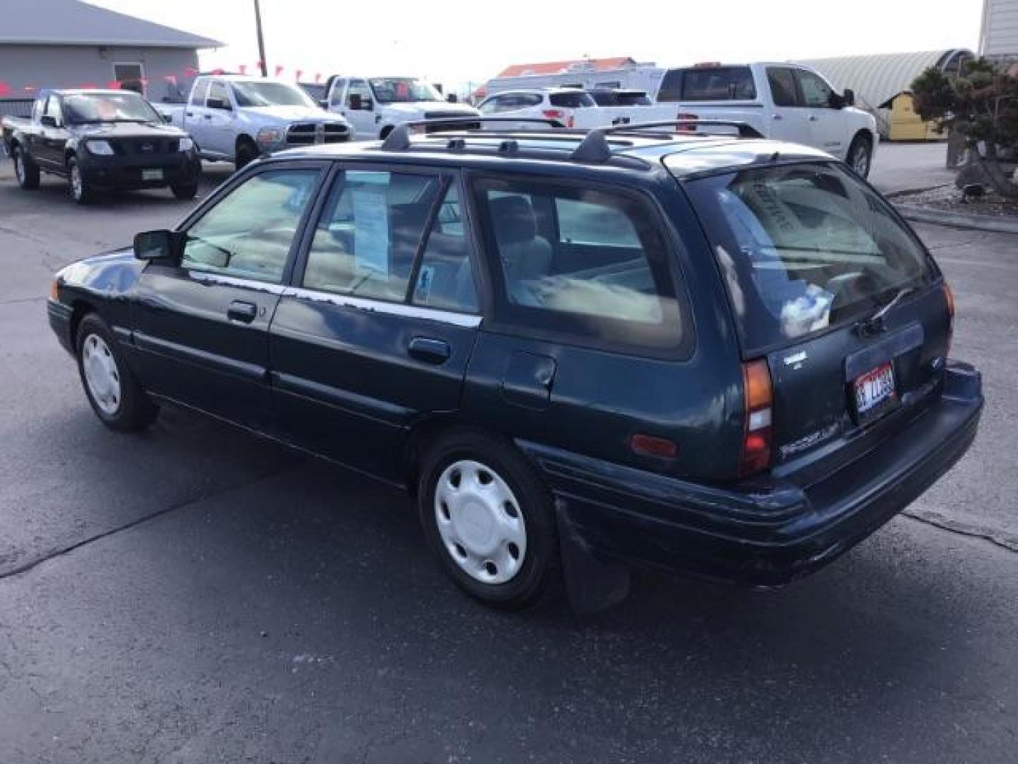 1995 Ford Escort Wagon LX (1FASP15J6SW) with an 1.9L L4 SOHC 8V engine, located at 1235 N Woodruff Ave., Idaho Falls, 83401, (208) 523-1053, 43.507172, -112.000488 - Photo#2