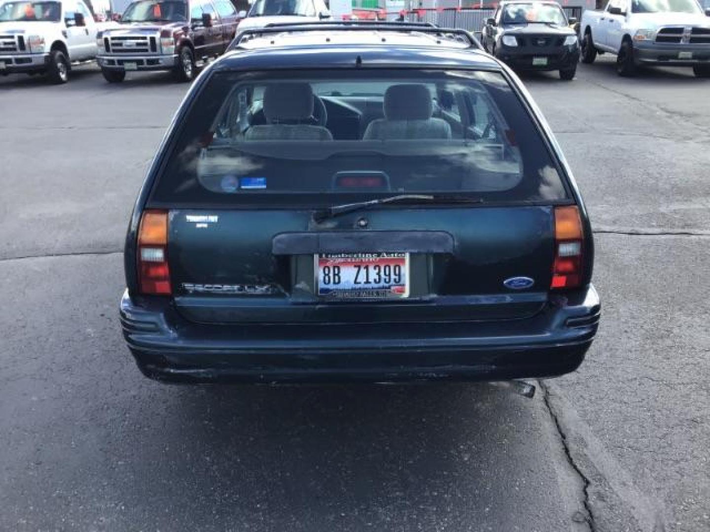 1995 Ford Escort Wagon LX (1FASP15J6SW) with an 1.9L L4 SOHC 8V engine, located at 1235 N Woodruff Ave., Idaho Falls, 83401, (208) 523-1053, 43.507172, -112.000488 - Photo#3