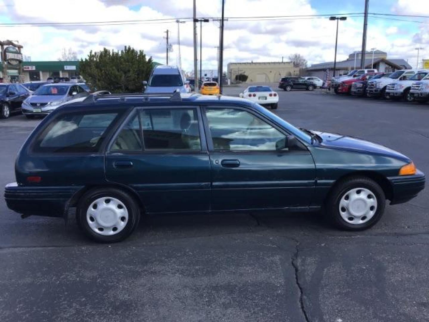 1995 Ford Escort Wagon LX (1FASP15J6SW) with an 1.9L L4 SOHC 8V engine, located at 1235 N Woodruff Ave., Idaho Falls, 83401, (208) 523-1053, 43.507172, -112.000488 - Photo#5