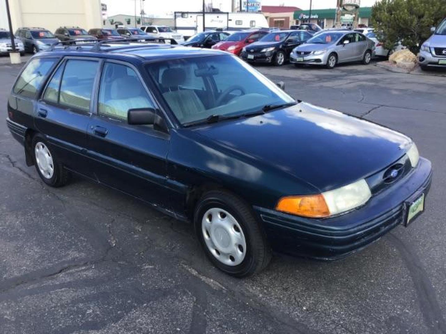 1995 Ford Escort Wagon LX (1FASP15J6SW) with an 1.9L L4 SOHC 8V engine, located at 1235 N Woodruff Ave., Idaho Falls, 83401, (208) 523-1053, 43.507172, -112.000488 - Photo#6