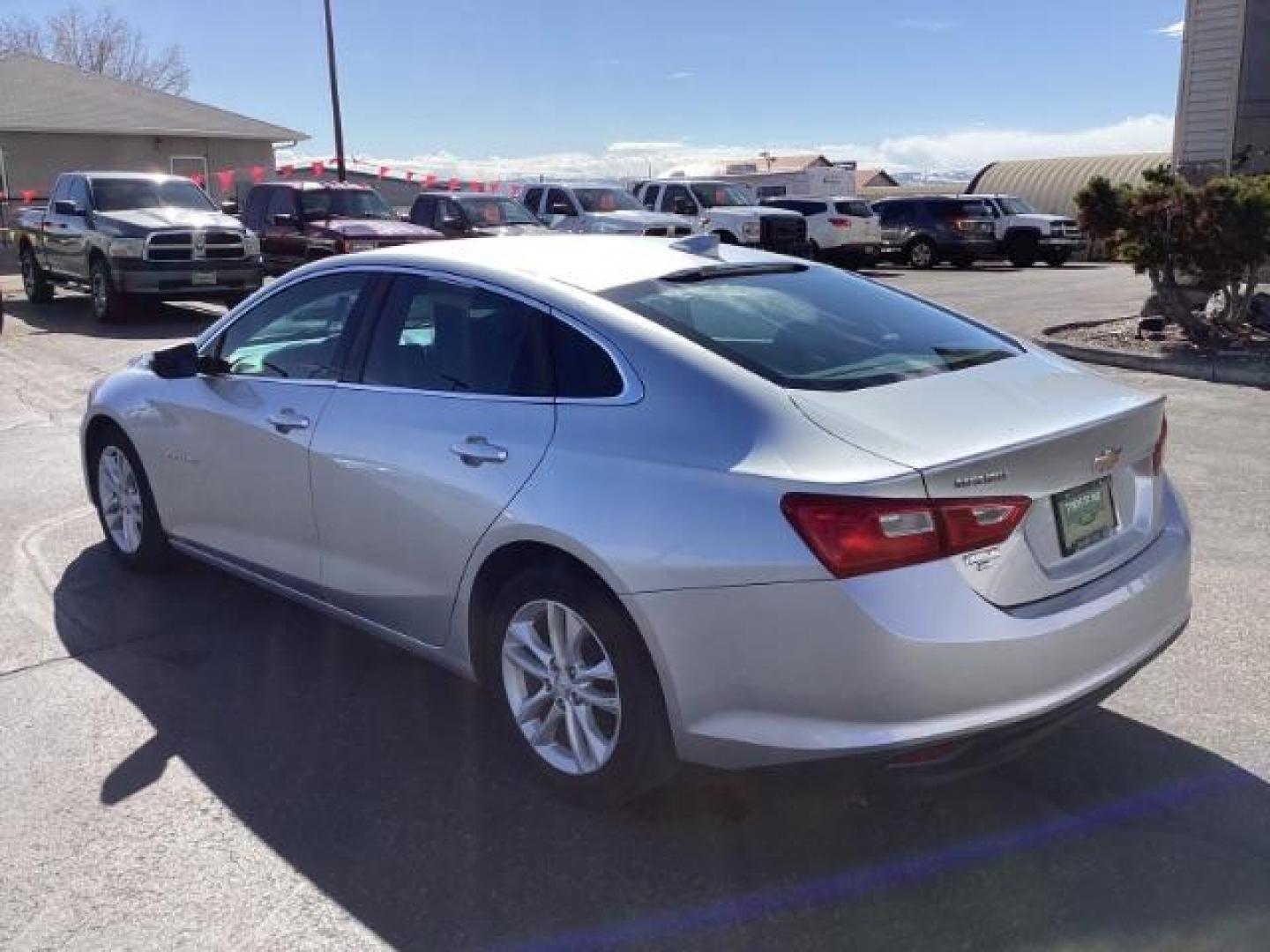 2016 Silver Ice Metallic Chevrolet Malibu SEDAN 4-DR (1G1ZE5ST5GF) with an 1.5L L4 DOHC 16V engine, 6-Speed Automatic transmission, located at 1235 N Woodruff Ave., Idaho Falls, 83401, (208) 523-1053, 43.507172, -112.000488 - The 2016 Malibu received a complete redesign, featuring a more modern and sophisticated exterior styling compared to its predecessor. The new design incorporated sleek lines, a more aerodynamic profile, and a slightly longer wheelbase, giving it a more upscale appearance. At Timberline Auto it is al - Photo#3