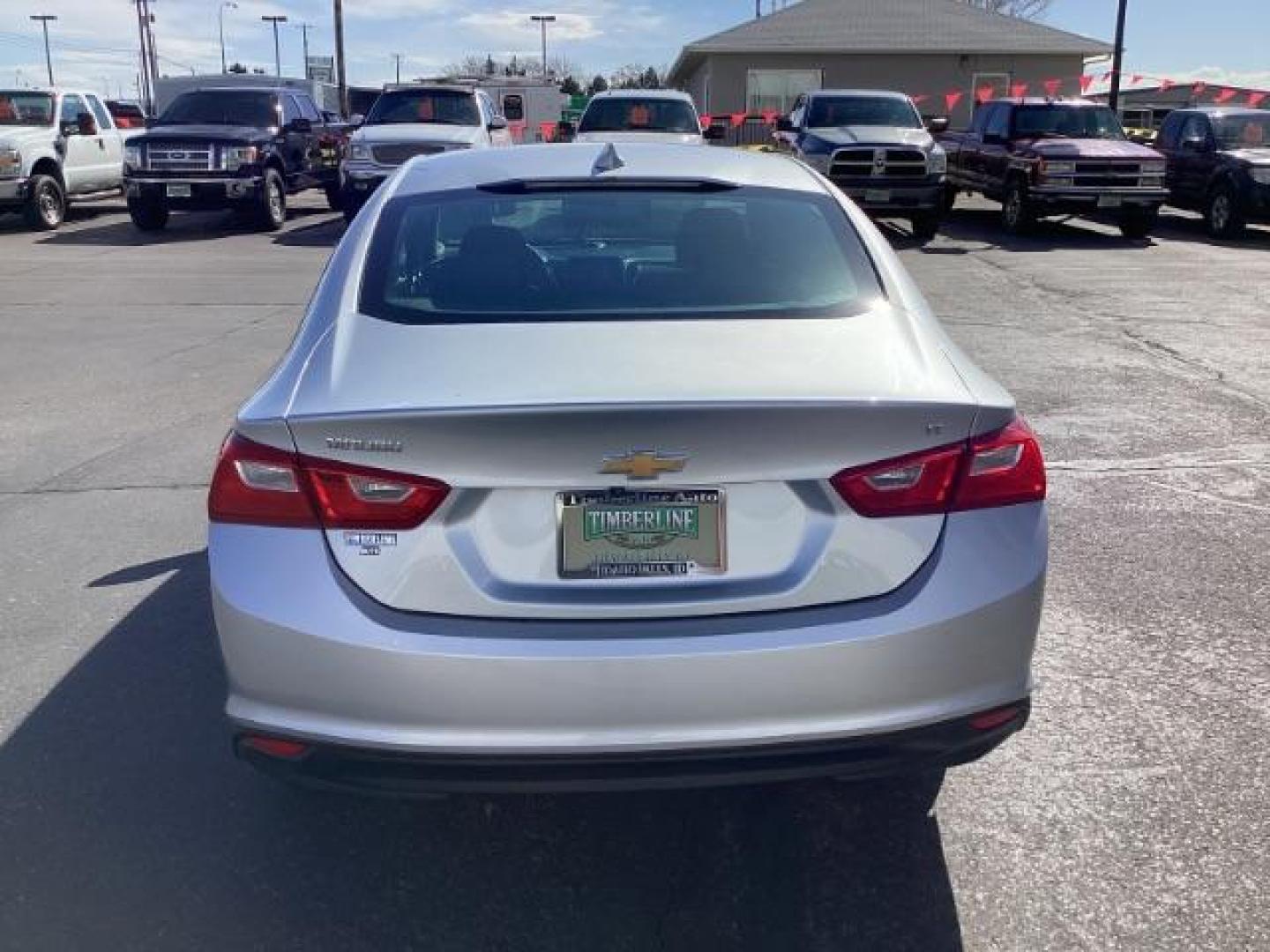 2016 Silver Ice Metallic Chevrolet Malibu SEDAN 4-DR (1G1ZE5ST5GF) with an 1.5L L4 DOHC 16V engine, 6-Speed Automatic transmission, located at 1235 N Woodruff Ave., Idaho Falls, 83401, (208) 523-1053, 43.507172, -112.000488 - The 2016 Malibu received a complete redesign, featuring a more modern and sophisticated exterior styling compared to its predecessor. The new design incorporated sleek lines, a more aerodynamic profile, and a slightly longer wheelbase, giving it a more upscale appearance. At Timberline Auto it is al - Photo#4